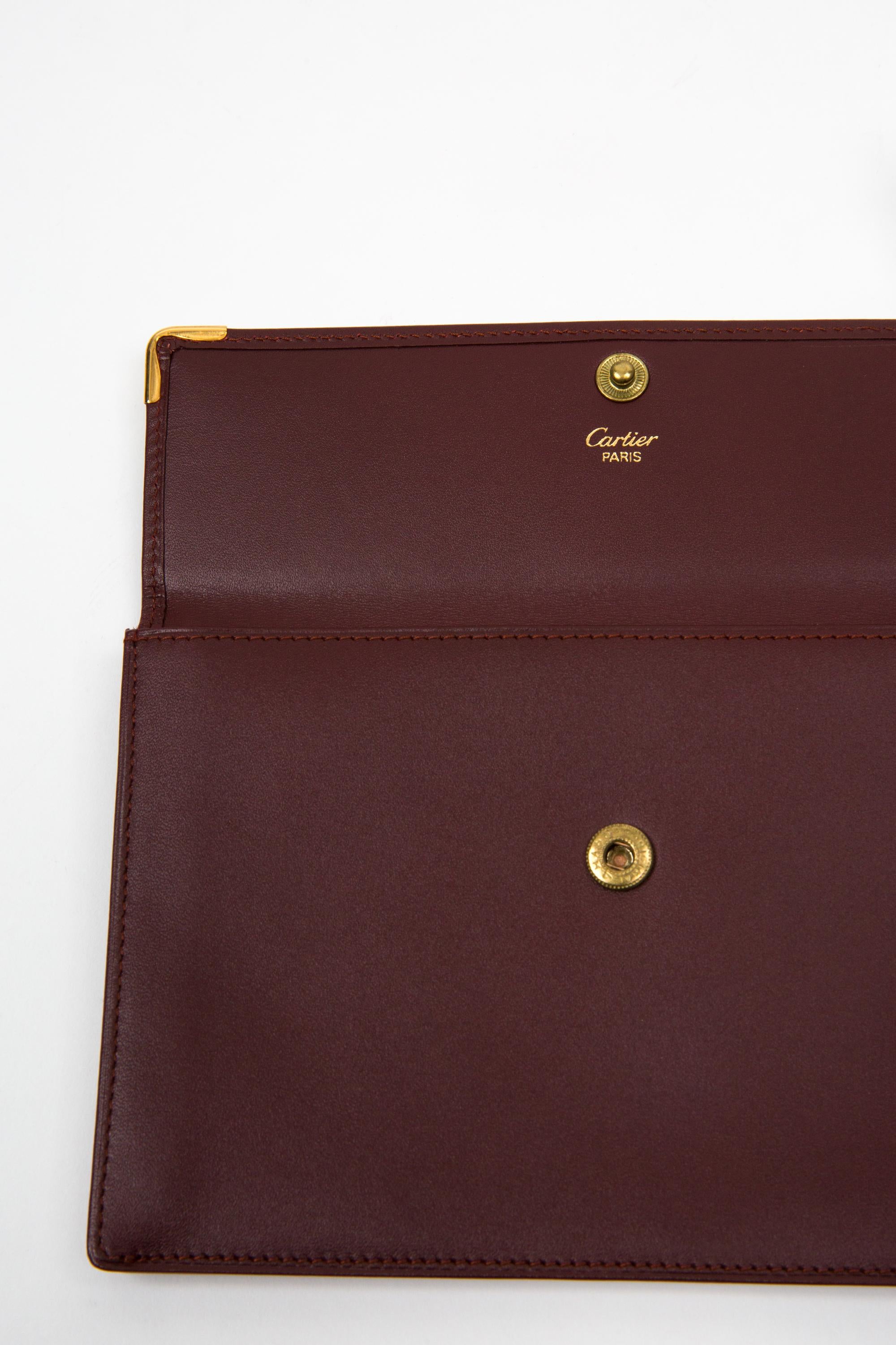 Pochette in pelle Cartier Bordeaux in vendita 1