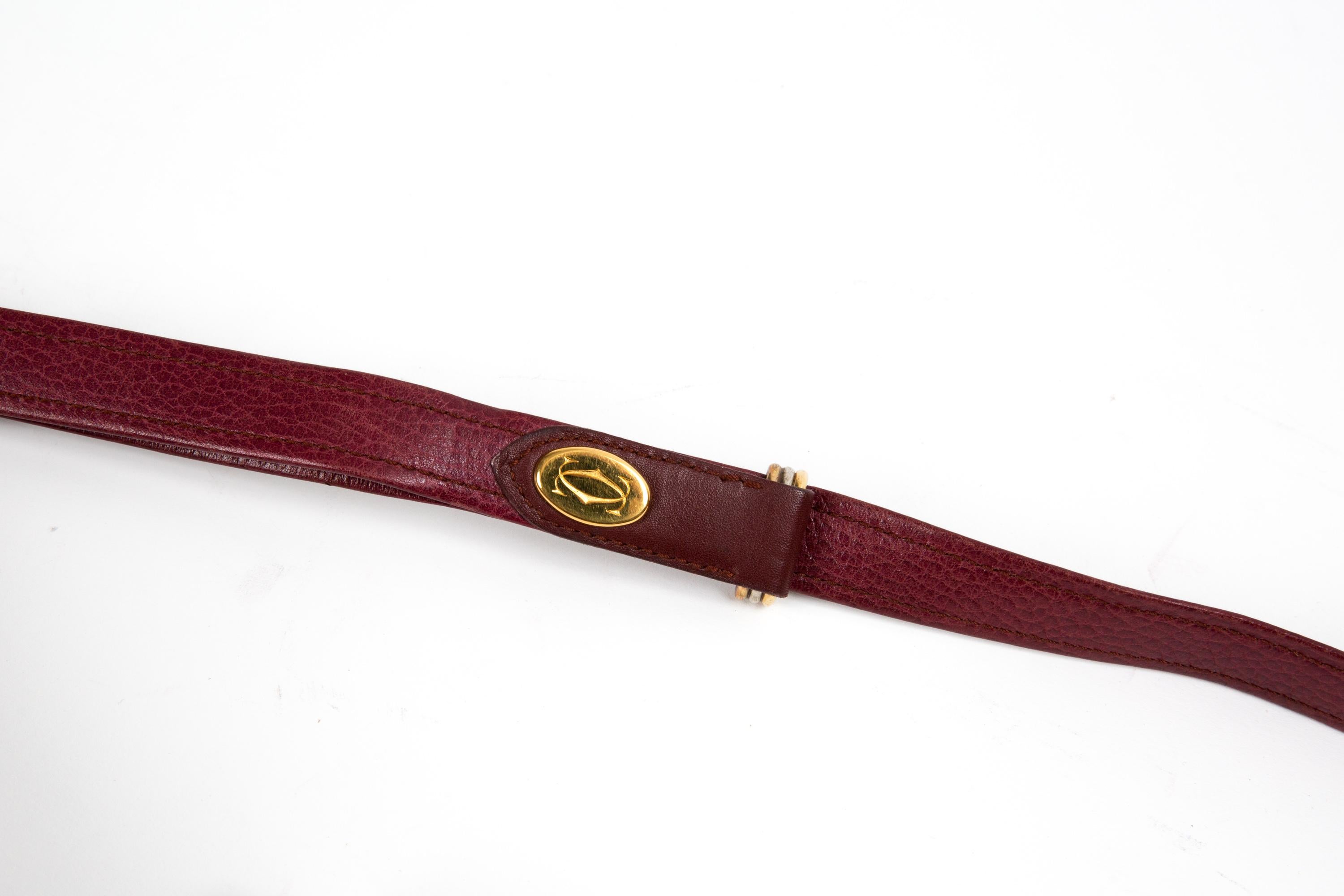 De las mujeres Cartier Bolso de hombro de piel burdeos en venta