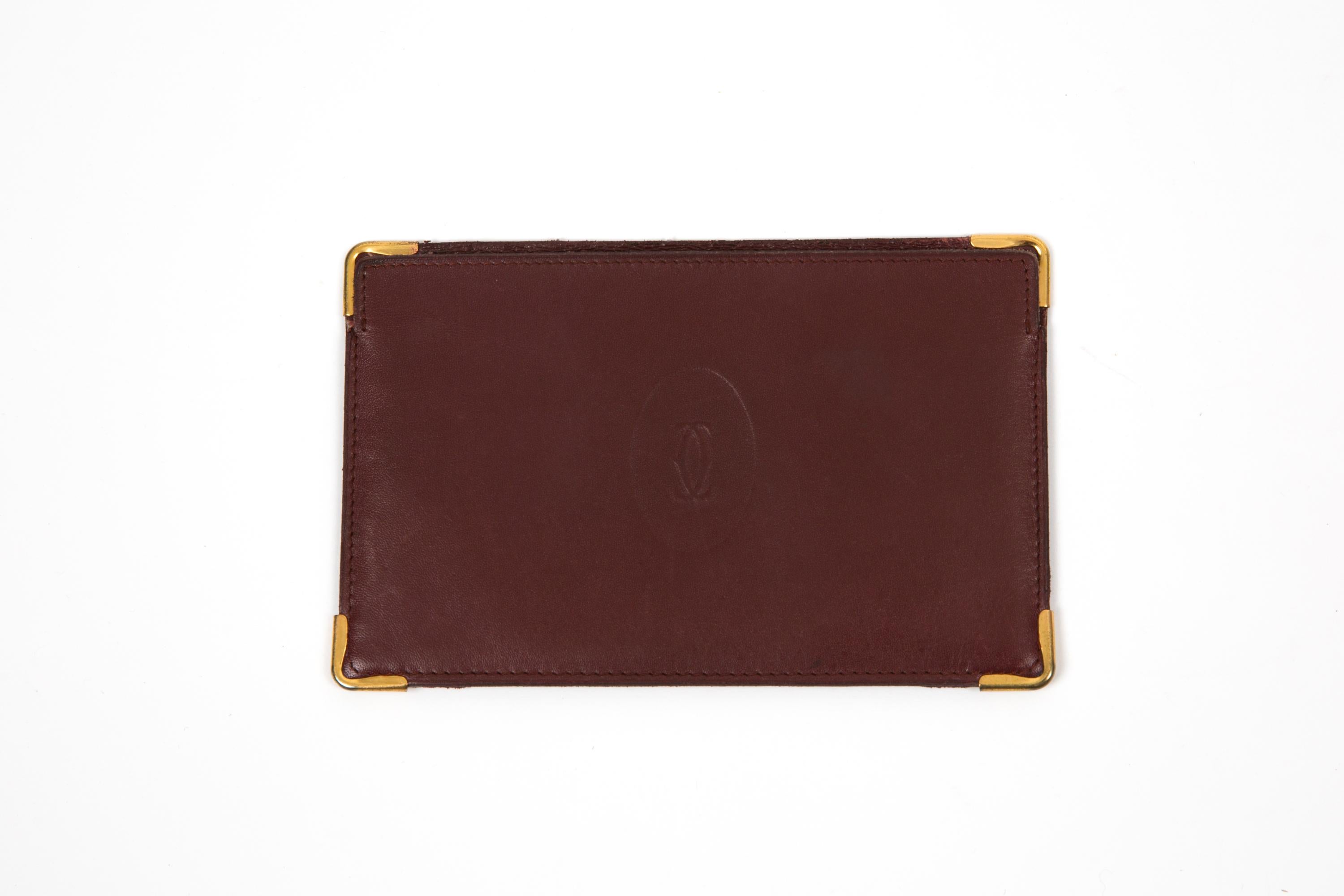 Women's or Men's Cartier Bordeaux Leather Simple Card Holder For Sale