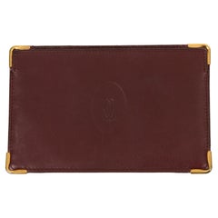 Porte-cartes simple en cuir bordeaux de Cartier