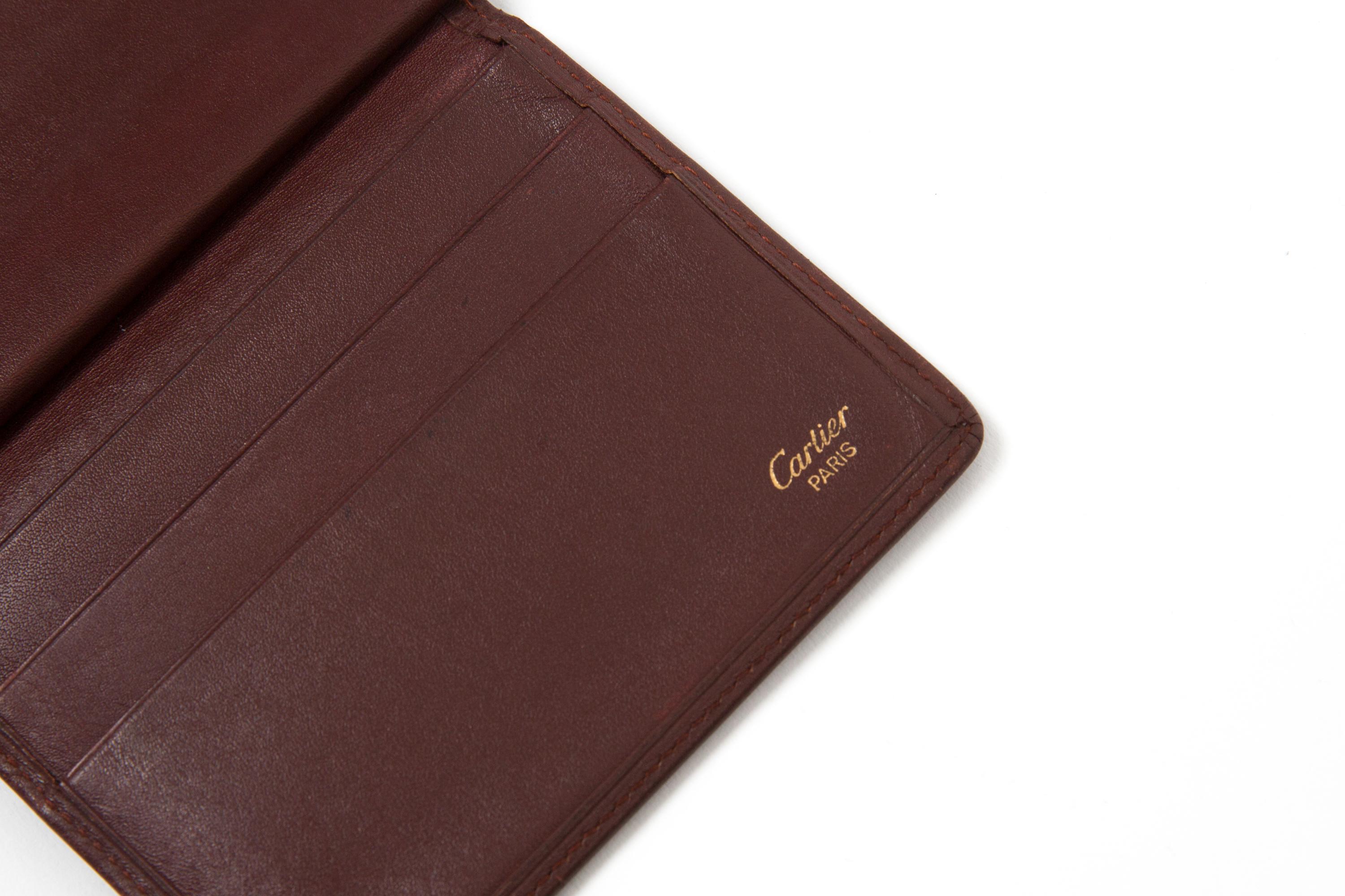 Women's or Men's Cartier Bordeaux Leather Wallet For Sale