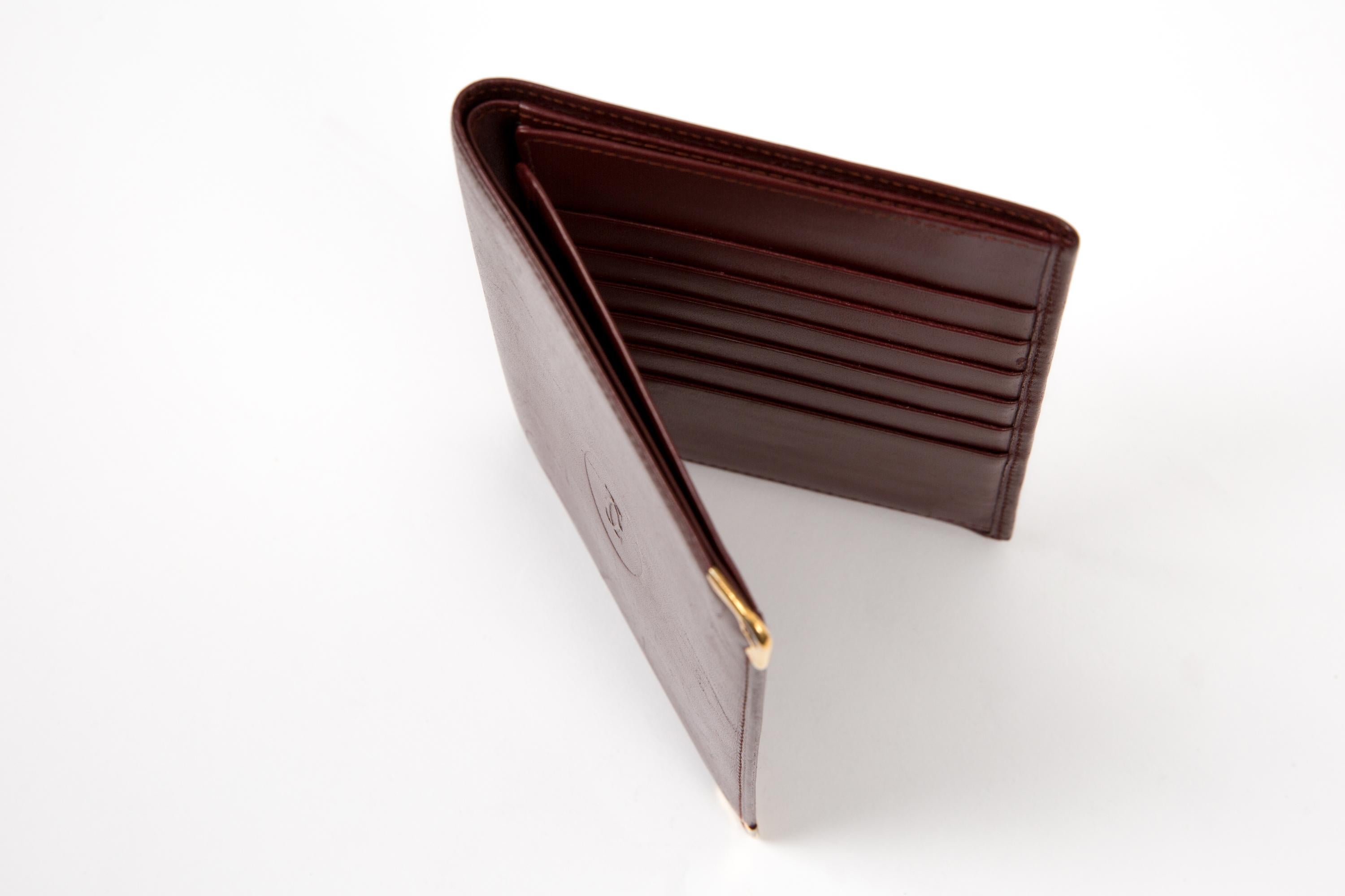 Women's or Men's Cartier Bordeaux Textured Long Leather Wallet For Sale