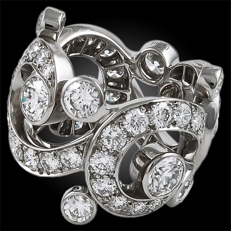 CARTIER Boudoir Diamond Eternity Ring in Platinum.

A fairly contemporary design by Cartier of the 'Boudoir' series, this eternity band features art nouveau-esque scroll designs in an openwork pattern of bead-set diamonds in a platinum