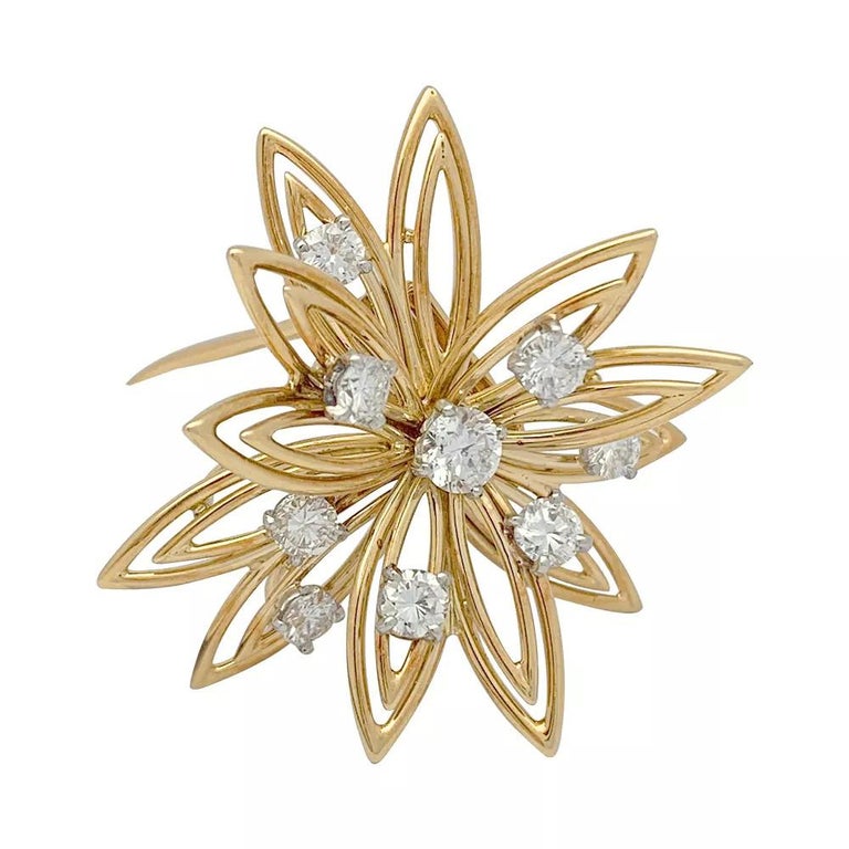 Cartier brooch, stylized flower set with diamonds. at 1stDibs
