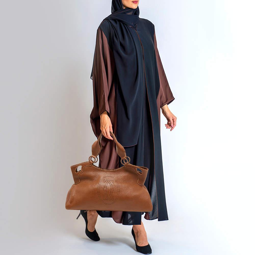 This Cartier accessory is an example of the brand's fine designs that are skillfully crafted to project a classic charm. It is a functional creation with an elevating appeal.

Includes: Original Dustbag