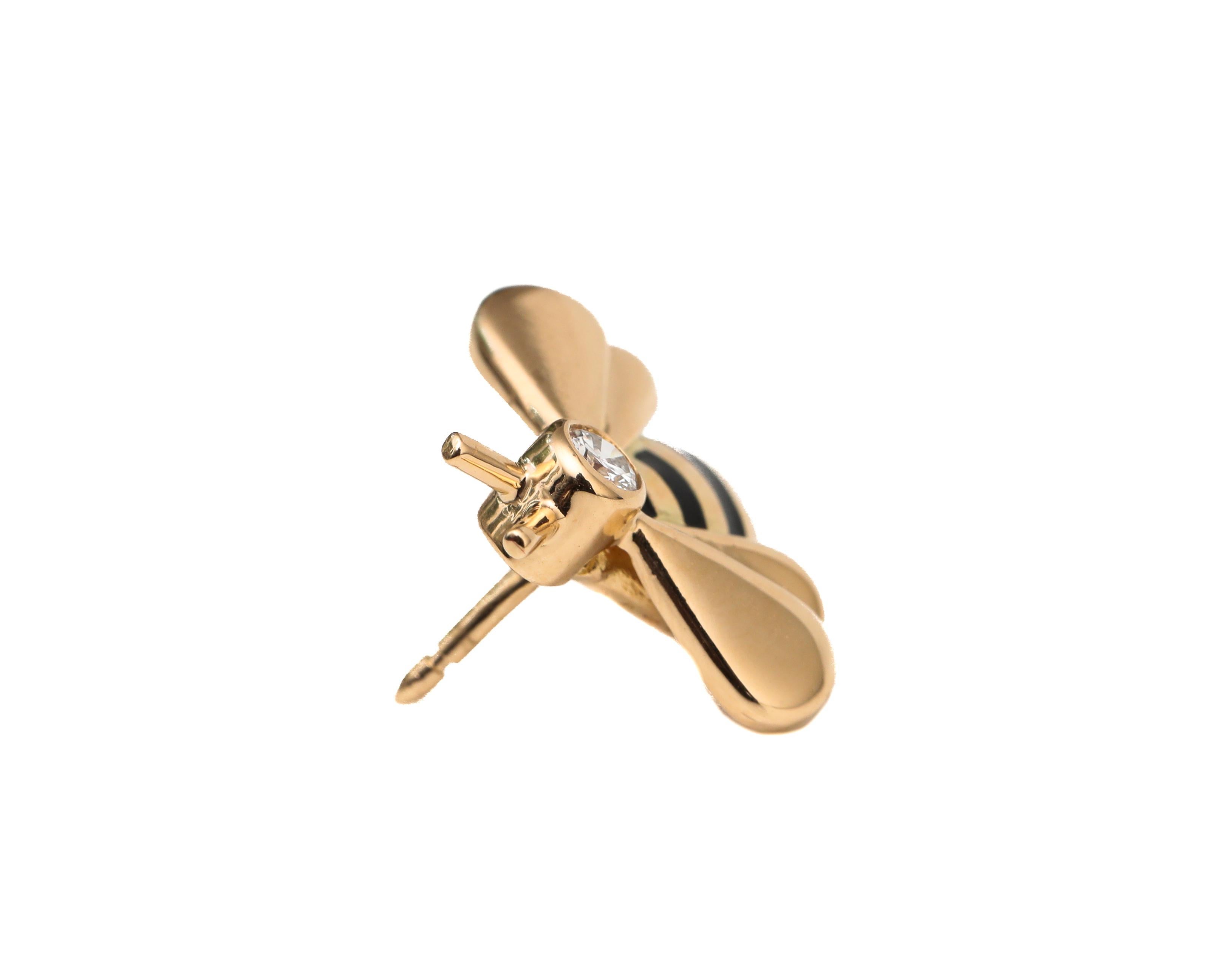 1990s Cartier Lapel Pin 
Bumble Bee
Crafted in 18 karat Yellow gold

Pin details:
Gold: 18 Karat Yellow Gold
Weight: 2.93 grams
Measures:

Features: 1 Diamond Accent 0.07 Carats, F color, VS clarity 
Mint Condition from the 1990s
Accompanied with a