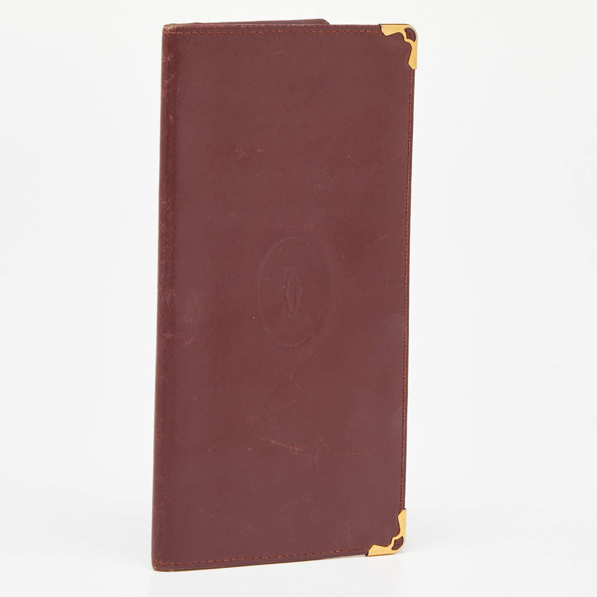 Cartier Burgundy Leather Must de Cartier Bifold Long Wallet In Good Condition In Dubai, Al Qouz 2
