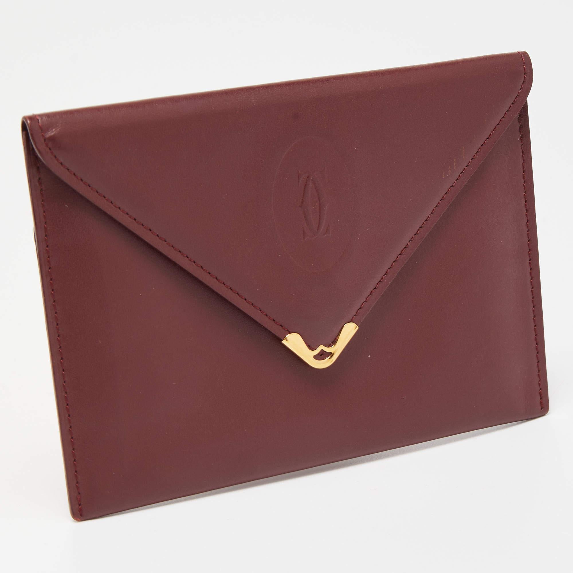 This Cartier burgundy wallet is a luxurious accessory that will prove to be super functional. It is made using durable materials on the exterior and unveils a well-organized interior.

