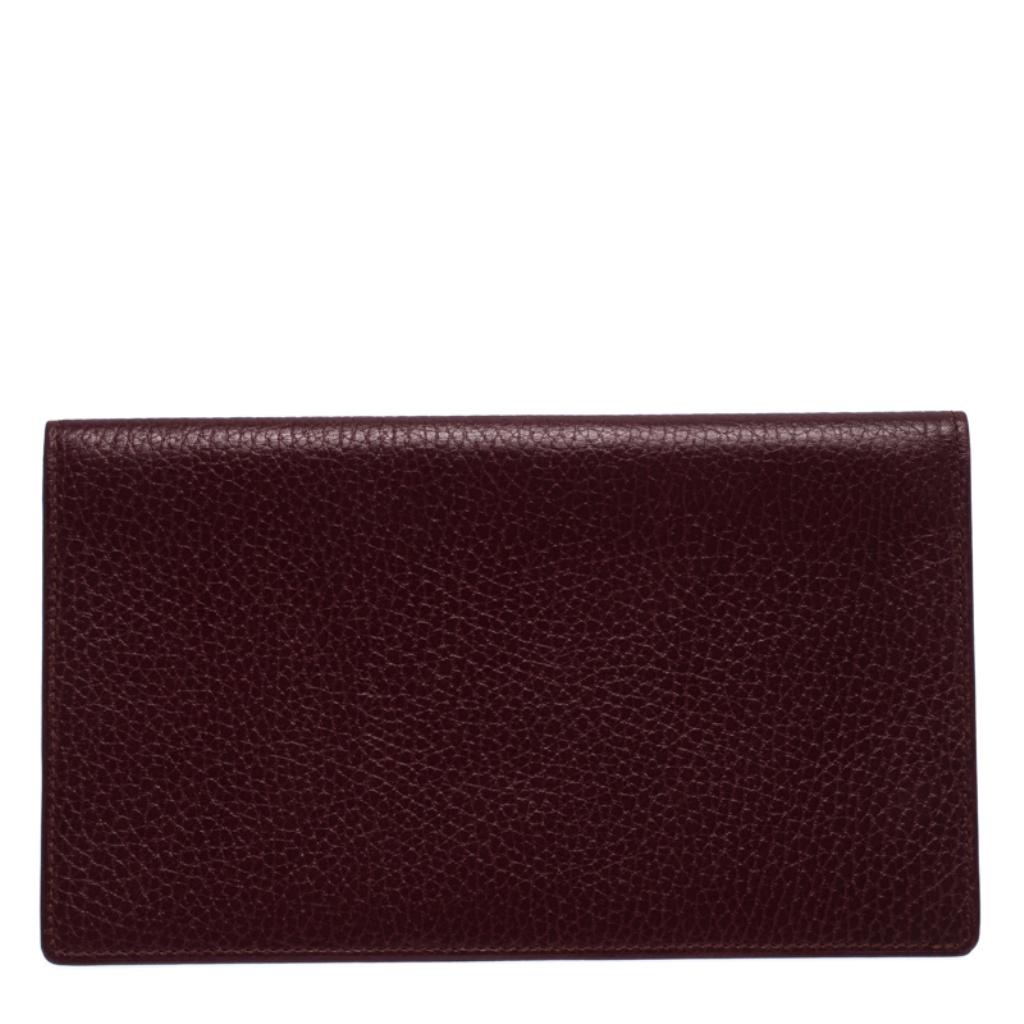 Carry your travel documents in style with this durable Cartier Passport Holder. Crafted from burgundy leather, this case opens up to a leather interior. It is well-designed to hold your passport.

Includes: Original Box, Authenticity Card

