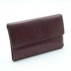 Cartier Burgundy Pebbled Leather Logo Tri-Fold Continental Wallet CR-W0930P-0405