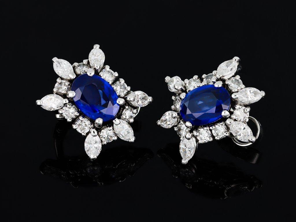 Oval Cut Cartier Burmese Sapphire and diamond earrings, French, 1988. For Sale