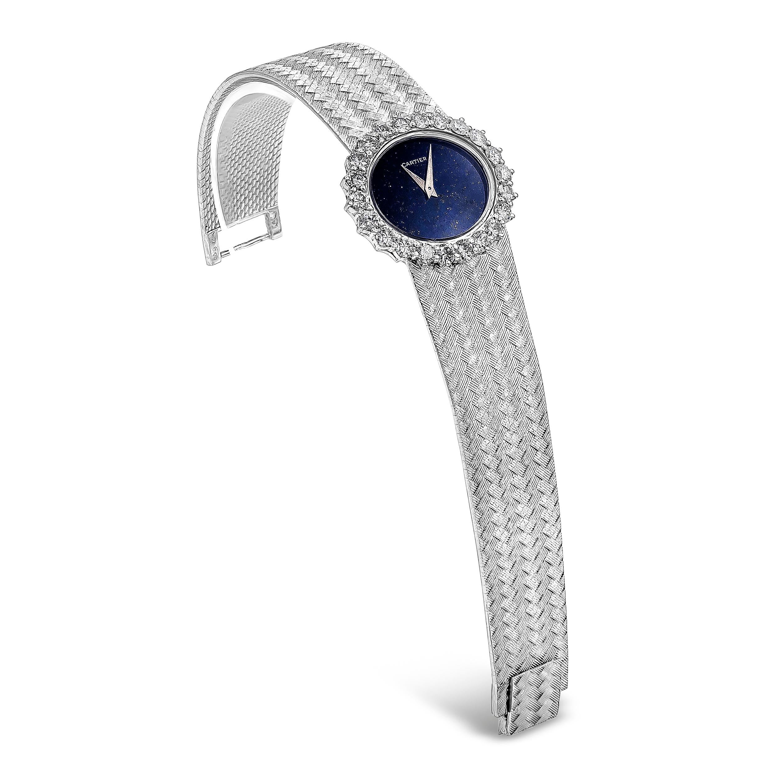 A rare limited edition Cartier by Piaget watch showcasing a lapis lazuli dial and a brilliant diamond bezel. Diamonds are approximately 2.50 carats total weight, F color, VS clarity. Set in a weave design bracelet made in 18K white gold. Mechanical