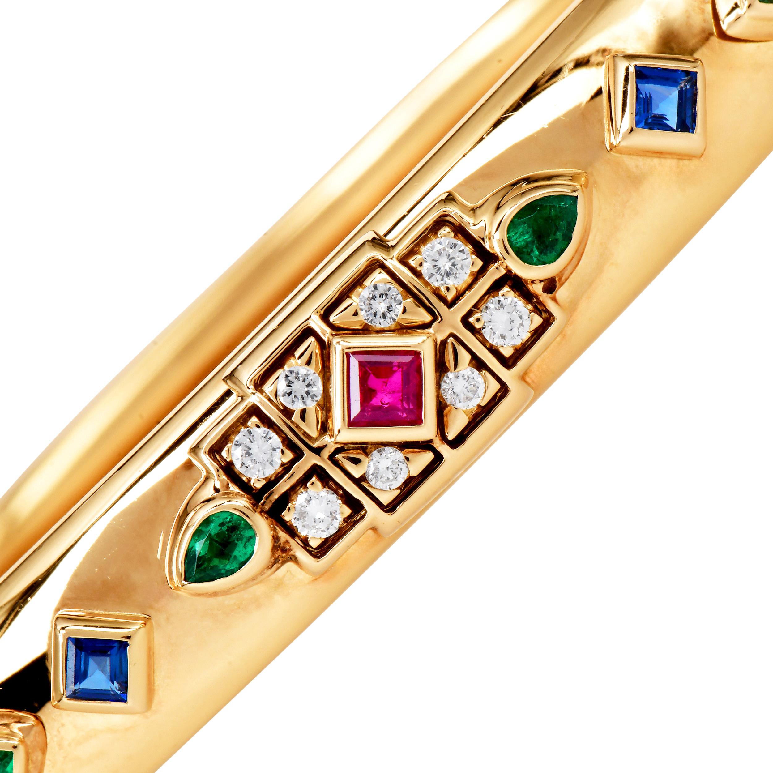 Cartier Byzantine Diamond, Sapphire, Ruby 
Emerald 18K Yellow Gold Bangle Bracelet — 1990s

This exquisite 1990s Cartier Byzantine bangle bracelet is masterfully crafted in 18K yellow gold and adorned with a vibrant assortment of diamonds and