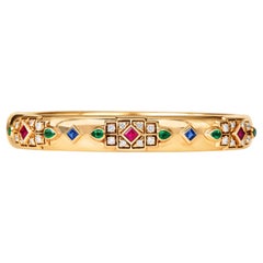 Cartier Byzantine Diamond Sapphire Ruby Emerald Yellow Gold Bangle Bracelet Cartier Byzantine Diamond Sapphire Ruby Emerald Yellow Gold Bangle Bracelet