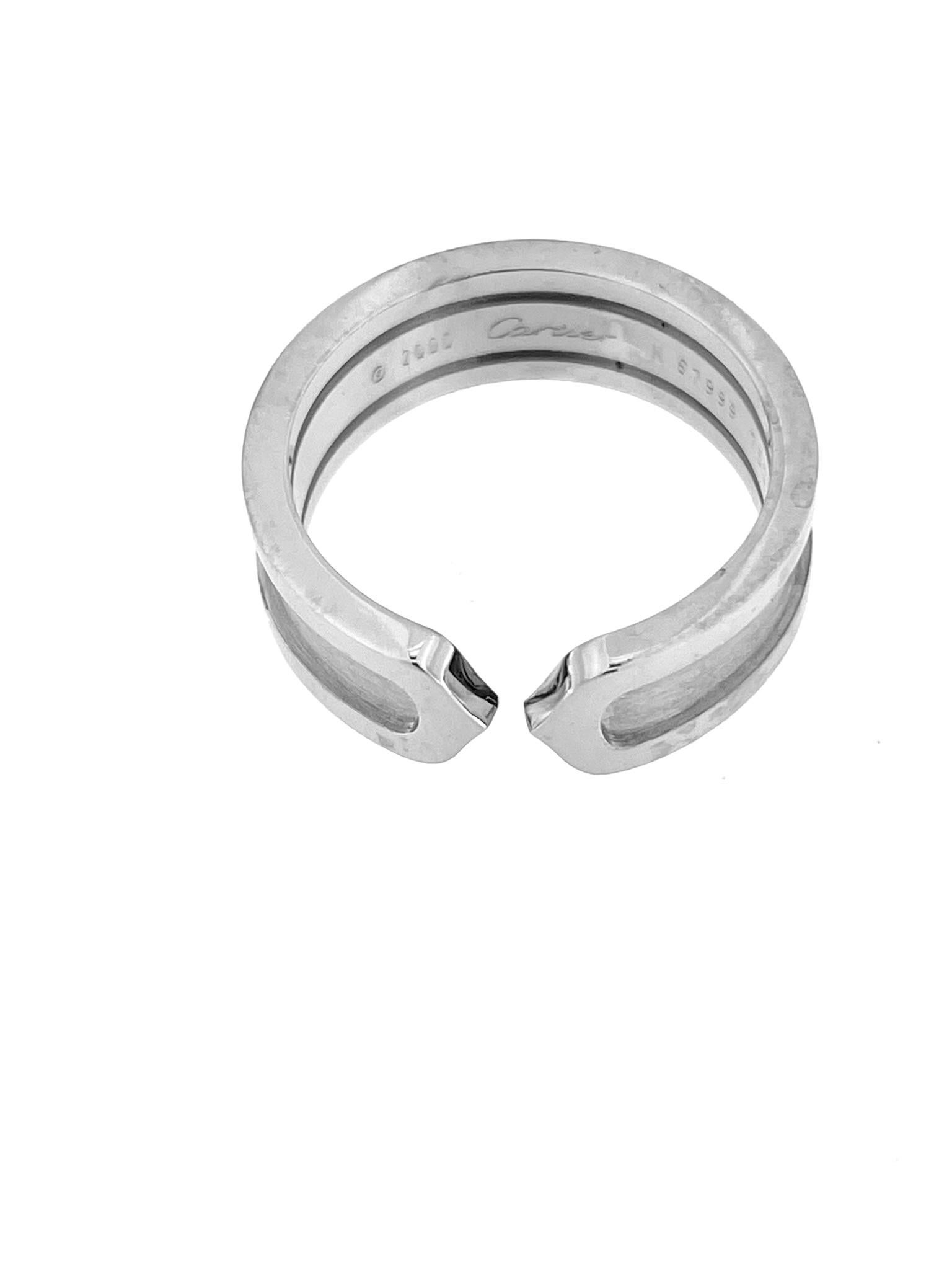 The Cartier C Collection Ring in 18-karat white gold is a stylish and contemporary piece of jewelry designed by Cartier, the renowned French luxury brand. The 