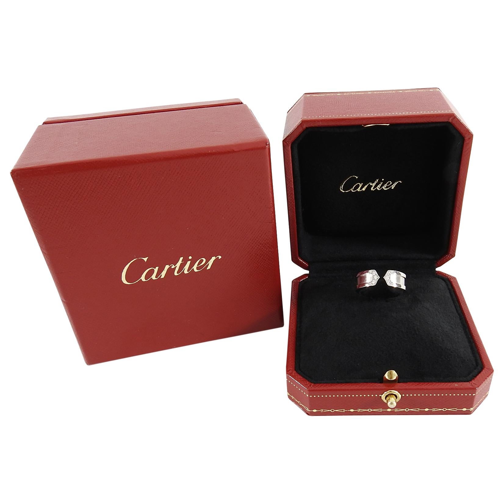 Cartier C de 18k White Gold Diamond Band Ring.  Original retail $3100 USD. Sleek 18k white gold band with classic C de Cartier design embellished with 10 white diamonds.  Marked size 52 (USA 6). 6mm wide. Includes original case and box. Excellent