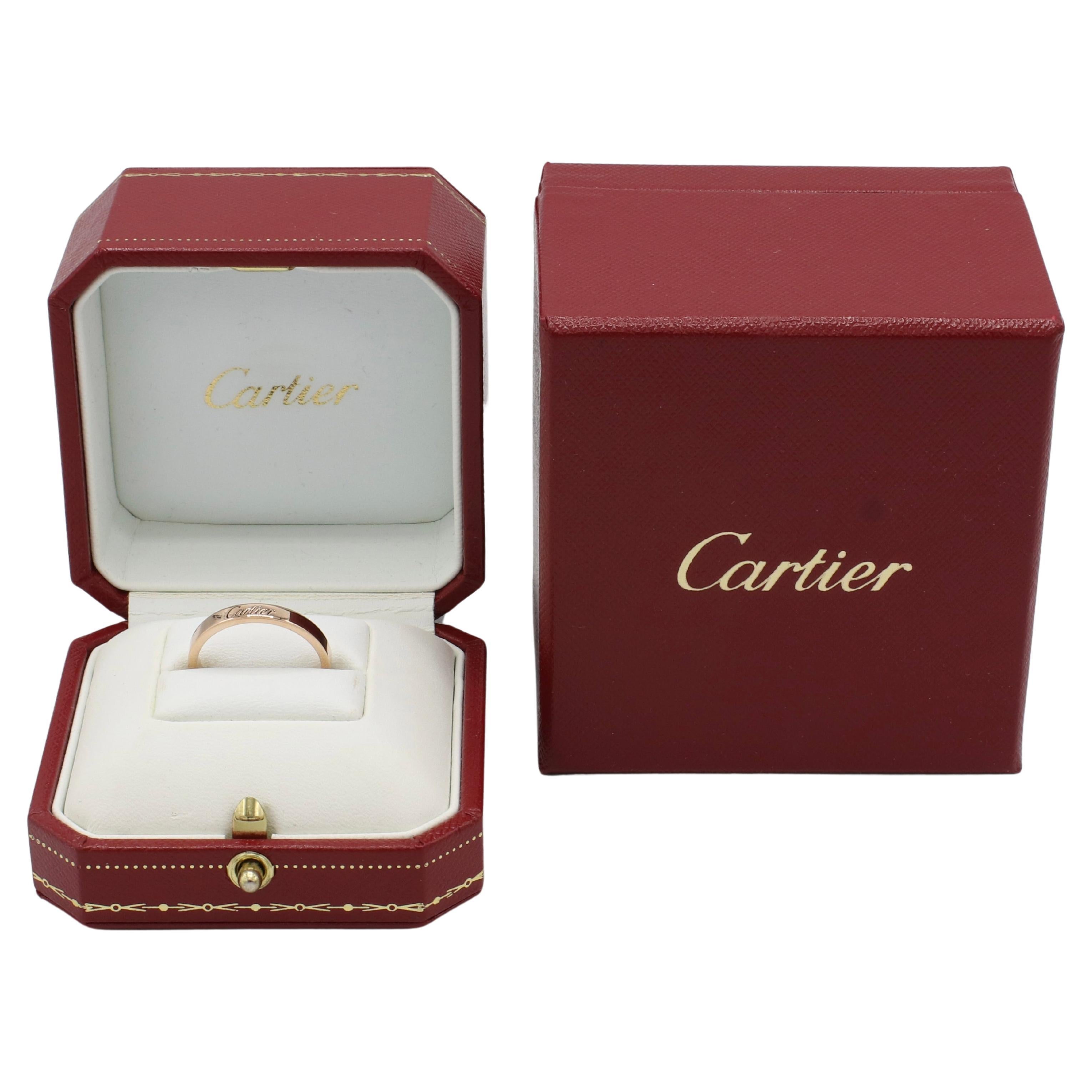 Cartier C De Cartier 18 Karat Rose Gold Wedding Band Ring 
Metal: 18k rose gold
Weight: 4.18 grams
Retail: $1,190 USD
Size: 58 ( 8.25 US)
Width: 3mm
