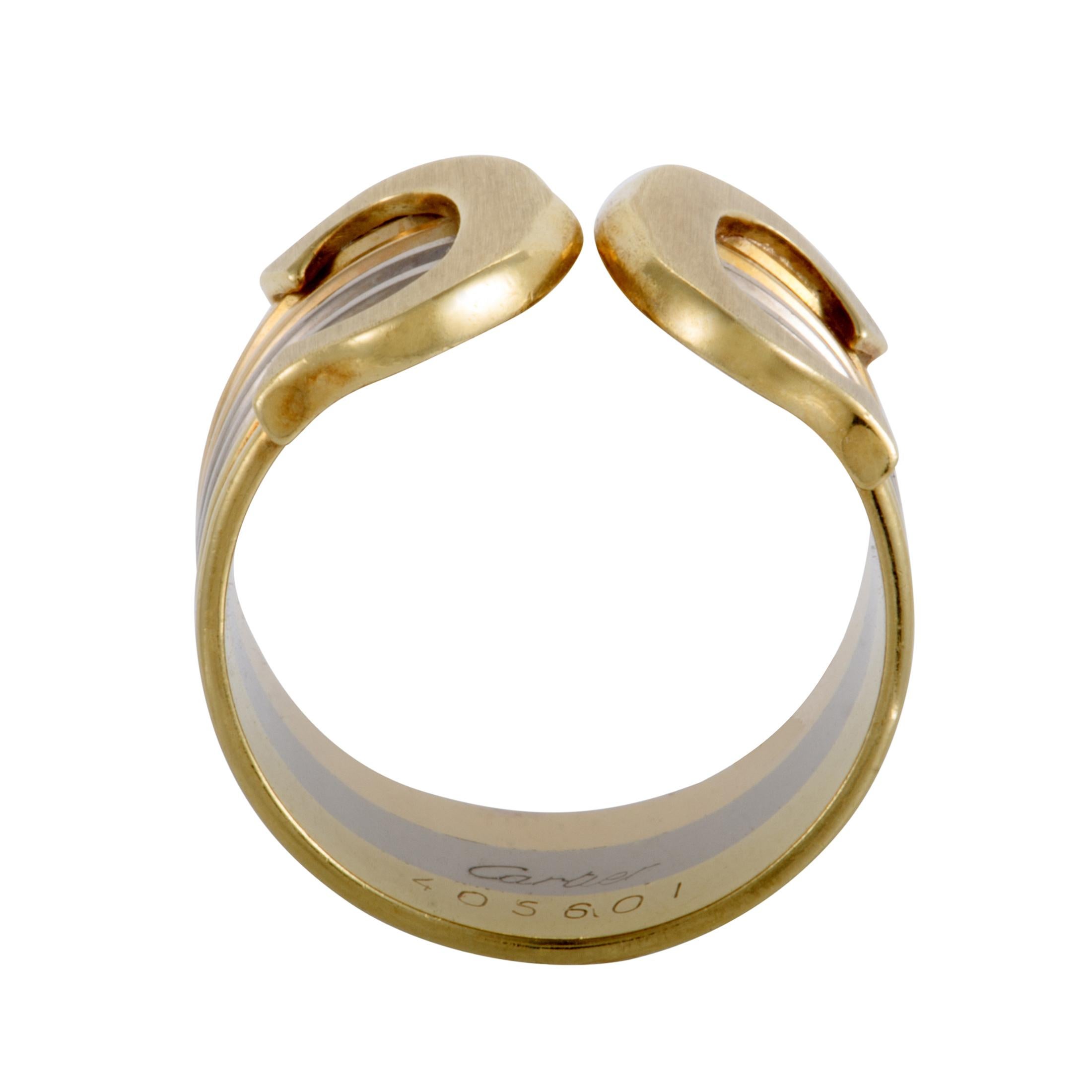 Diverse nuances and identical spotless gleam of precious 18K yellow, white and rose gold produce an exceptional sight in this gorgeous ring from Cartier which holds strong ties to the brand’s illustrious history with its intriguing design.
 Ring Top