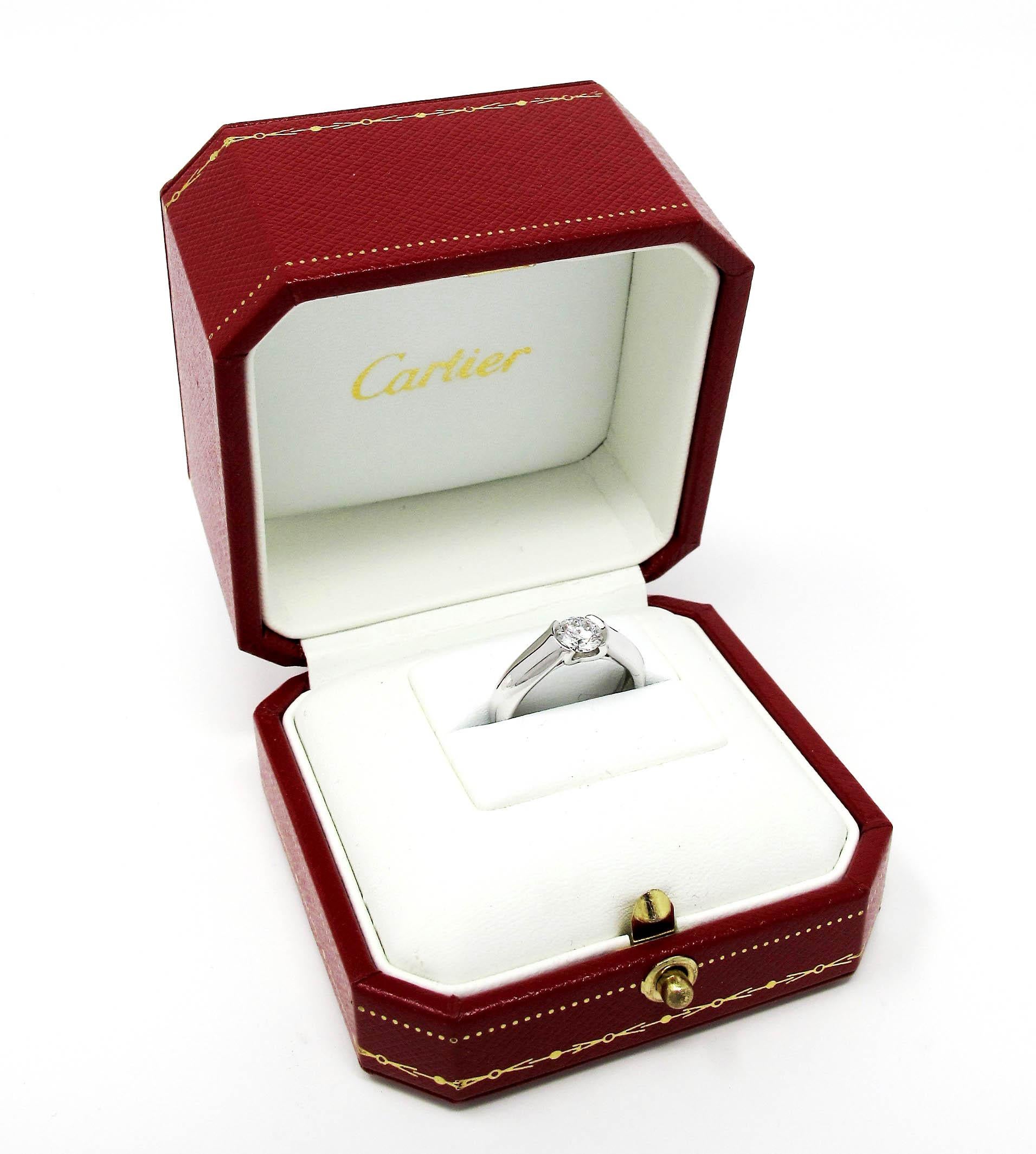 Say yes to this stunning diamond engagement ring from the Cartier C de Cartier Collection. With the icy white brilliance of the diamond, paired with the high polished modern band design, popping the question with this extraordinary ring is a