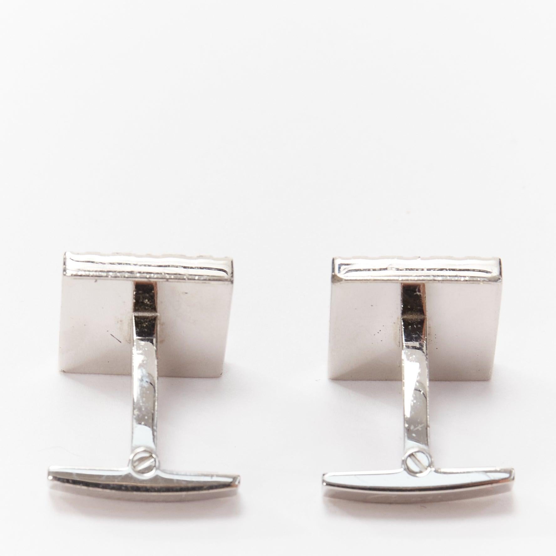 CARTIER C de Cartier Decor 925 sterling silver monogram square cufflinks
Reference: YIKK/A00046
Brand: Cartier
Model: C de Cartier Decor
Material: Metal
Color: Silver
Pattern: Monogram
Closure: Clip On
Lining: Silver Metal
Extra Details: C de