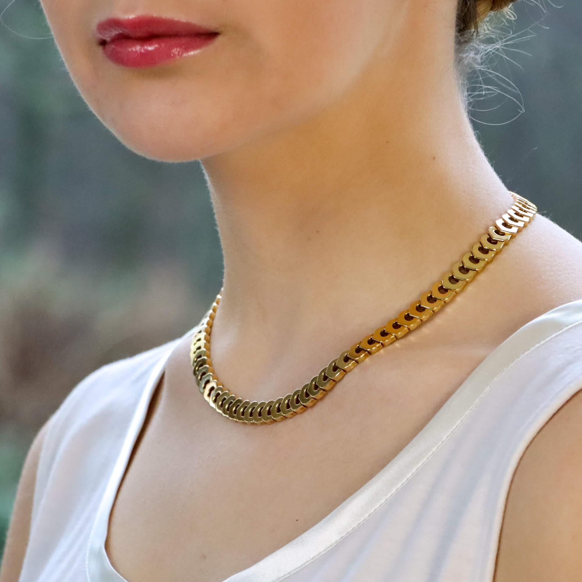 A beautiful C de Cartier link necklace made of solid 18k yellow gold.

The necklace is composed of exactly 84 iconic Cartier C links and sits beautifully once on the neck. Due to the design of the necklace it could easily be worn by itself as a