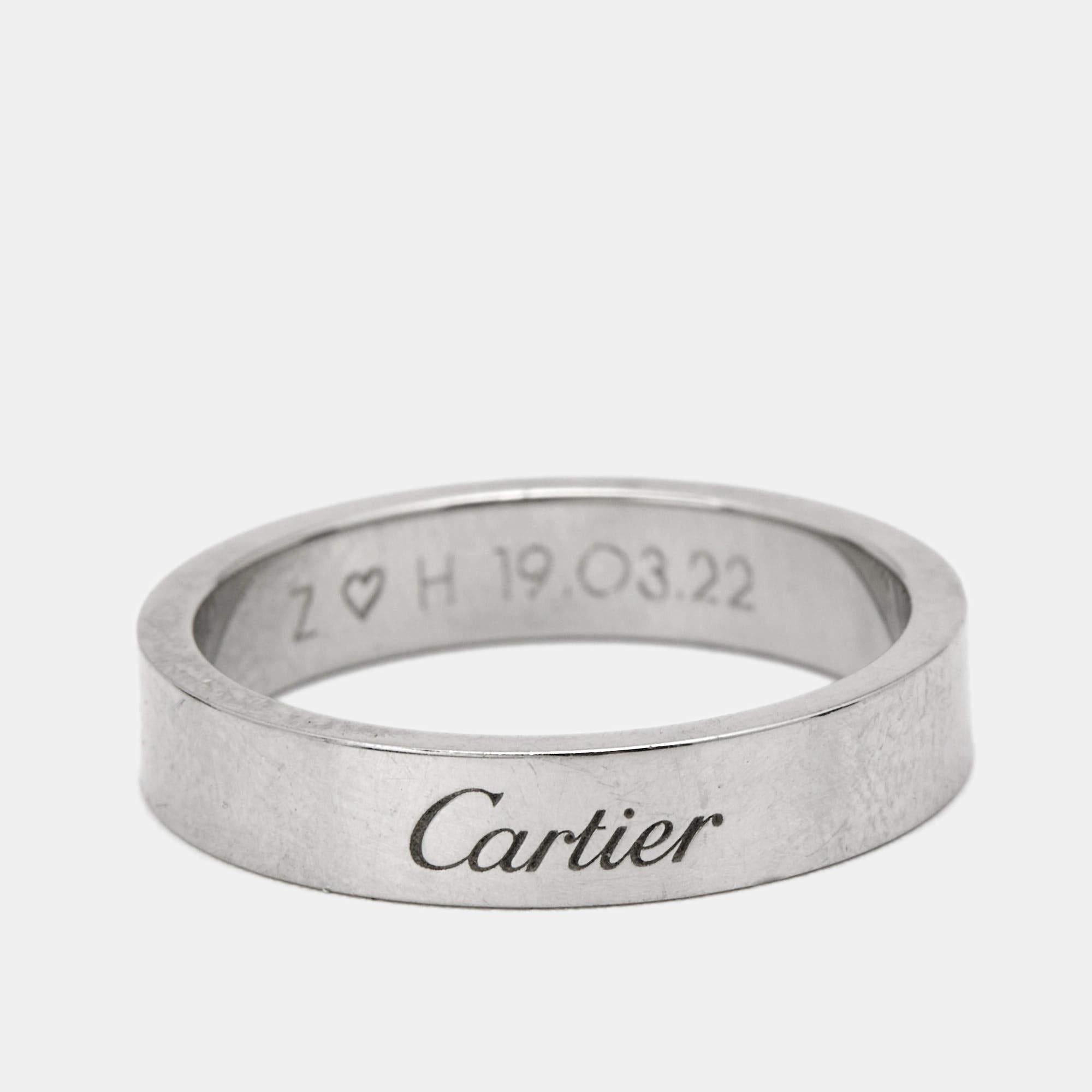 Let this C de Cartier band ring be a favored choice when it comes to choosing a ring for daily wear. The ring is made from platinum and is highlighted by brand engravings. It will be a prized accessory you will love wearing every day.

Includes: