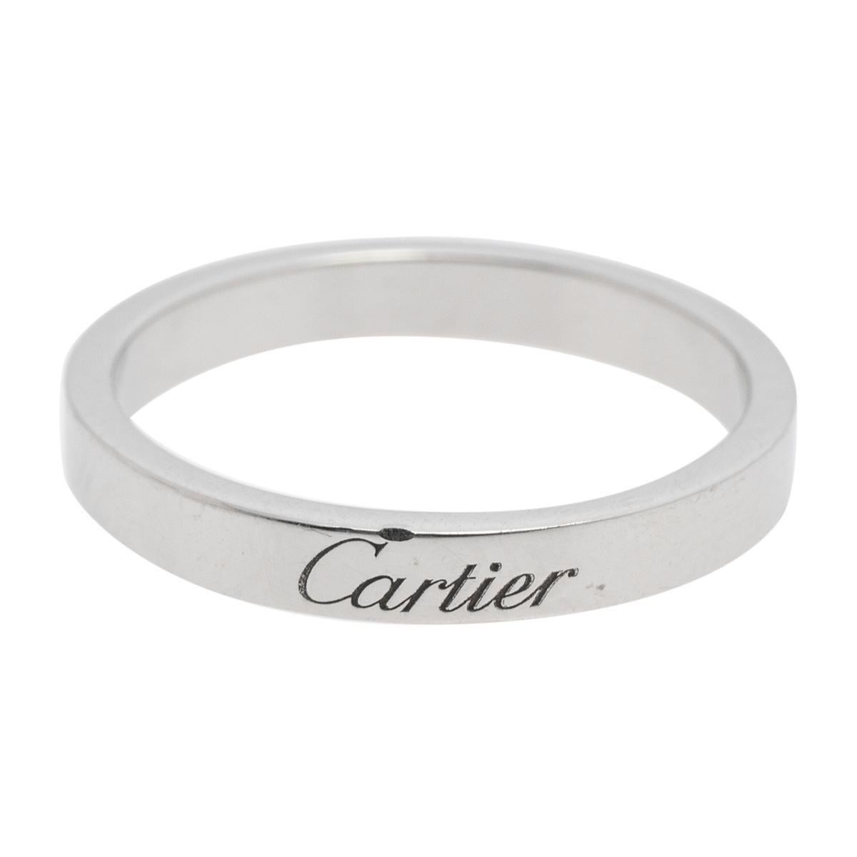 Let this C de Cartier band ring be a favored choice when it comes to choosing a wedding or engagement ring. The ring is made from platinum and highlighted by brand engravings. It will be a prized accessory you will love wearing every day.

Includes: