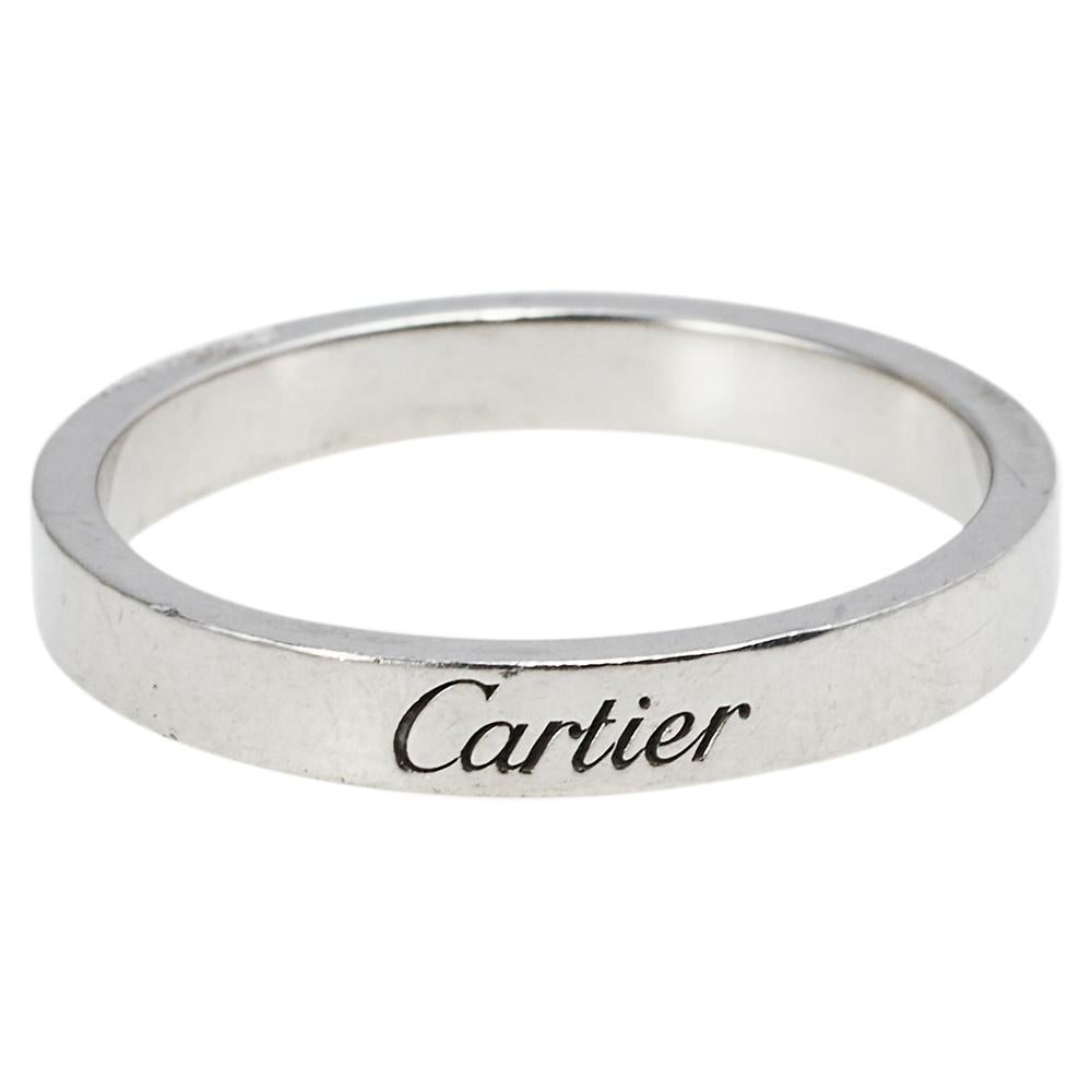 Love all things timeless? Then you'll instantly fall in love with this enchanting Cartier ring. Fashioned in platinum, this ring will add allure and sophistication to your look. Meticulously designed, this wedding ring will continually make an