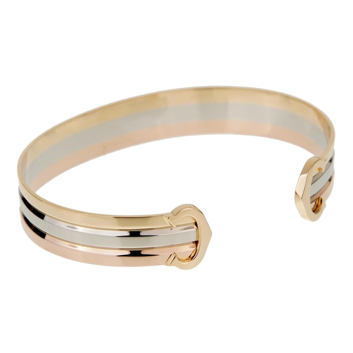 A chic Cartier bracelet from the C de Cartier collection featuring white, yellow and rose gold complemented with the iconic Cartier C motifs.

Size Medium, Upto 6 3/4