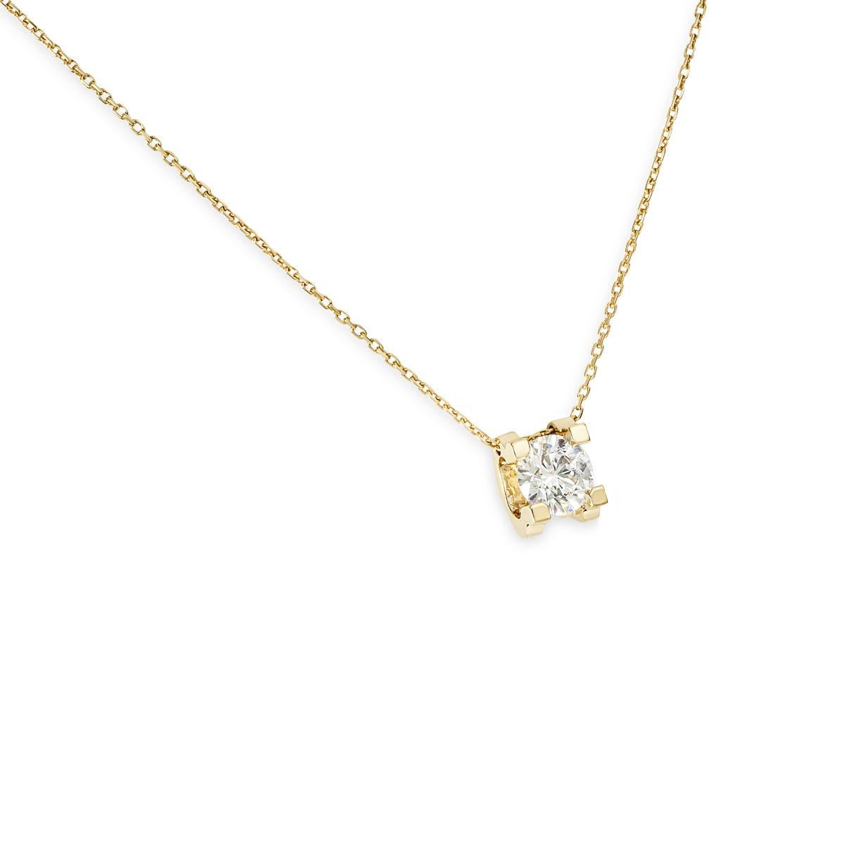 A stunning 18k yellow gold diamond necklace from the C de Cartier collection by Cartier. The necklace is set to the centre with a 1.14ct round brilliant cut diamond, G colour and VS1 in clarity. The diamond is set in the signature C de Cartier mount