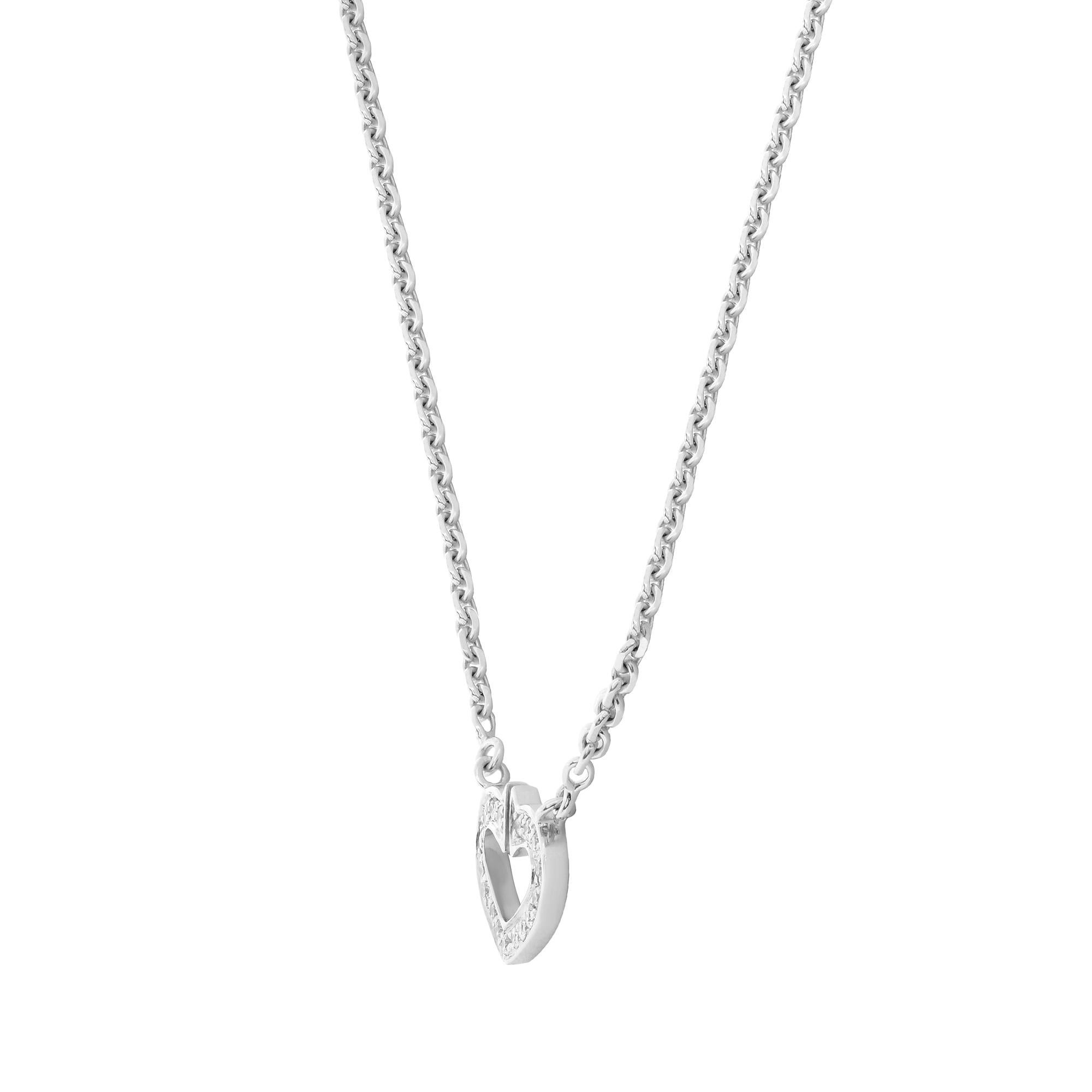 Cartier 18k white gold Coeur C de diamond Heart necklace. This necklace is from the Heart and Symbols Cartier collection.  A precious diamond heart pendant with approximately 0.09ctw diamonds sits at the center of this 18k white gold necklace.