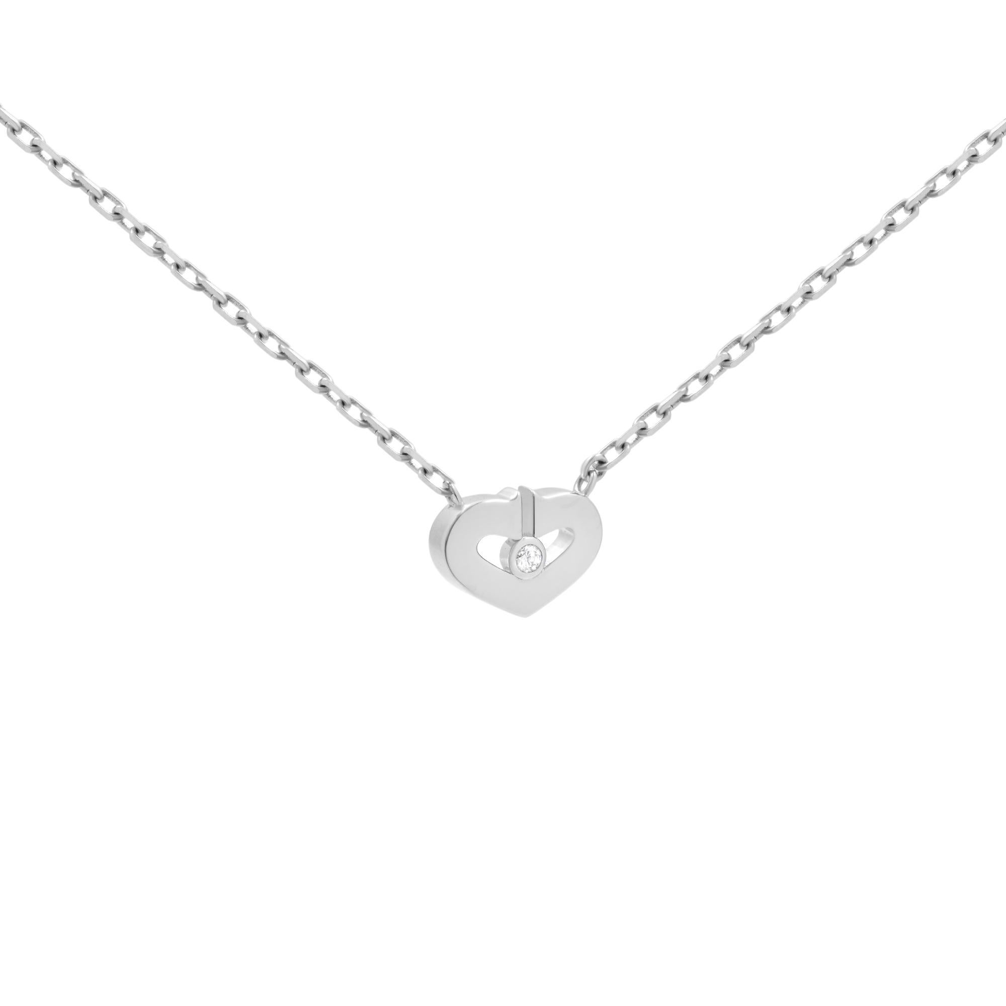Cartier Heart C necklace in 18K white gold. This alluring piece features a C heart that opens at the top and is adorned with a dazzling diamond at the center. Diamond size: 0.02cttw. Chain length: 16 inches. Excellent pre-owned condition. Original