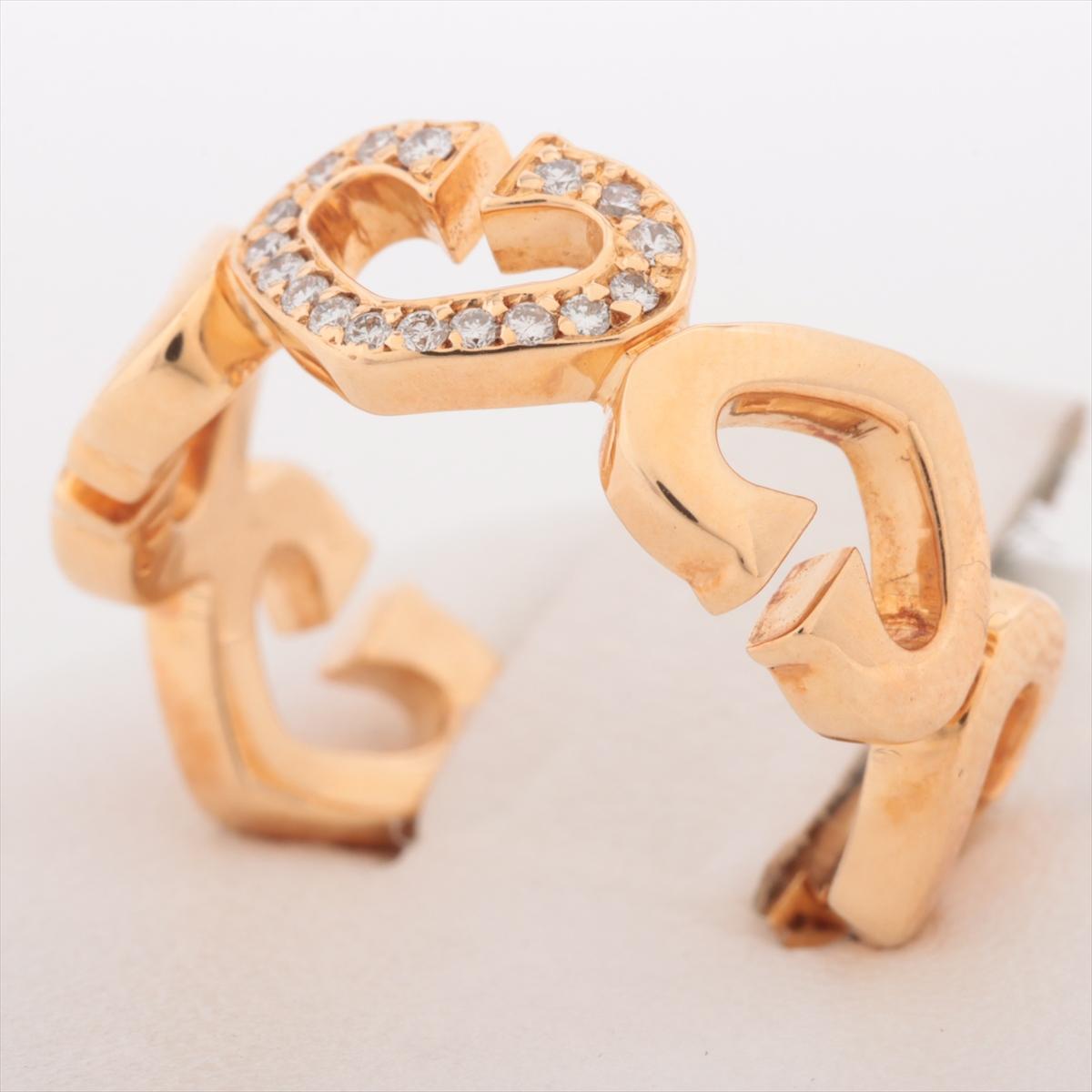 The Cartier C Hearts Diamond Ring in Gold is a captivating expression of love and elegance. Crafted with meticulous attention to detail, the ring features iconic 