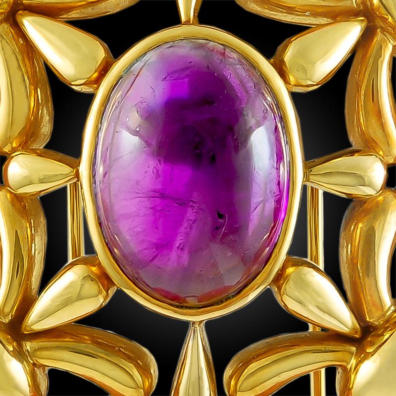 Cartier Paris 1970s Celtic Design Cabochon Amethyst  Coral Gold Brooch Pin in an openwork design. The most suitable elegant dress or suit pin. Chic 1970s color combination.
Signed Cartier, 1970s.
Measurements – approx. 2 1/2″ x 2″