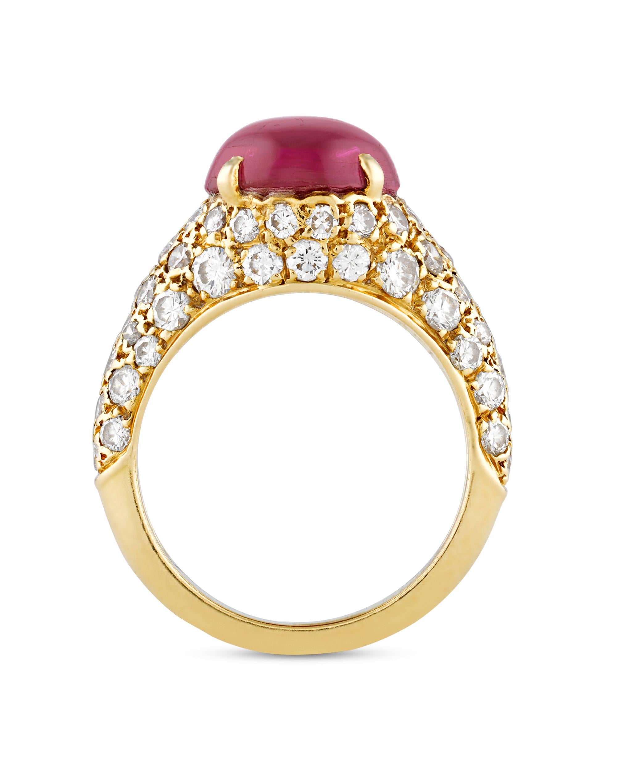 This classic and stylish ring from the celebrated house of Cartier boasts a modern elegance. An exceptionally rare cabochon ruby weighing approximately 4.00 carats rests at its center, while the remainder of the 18K yellow gold setting features an