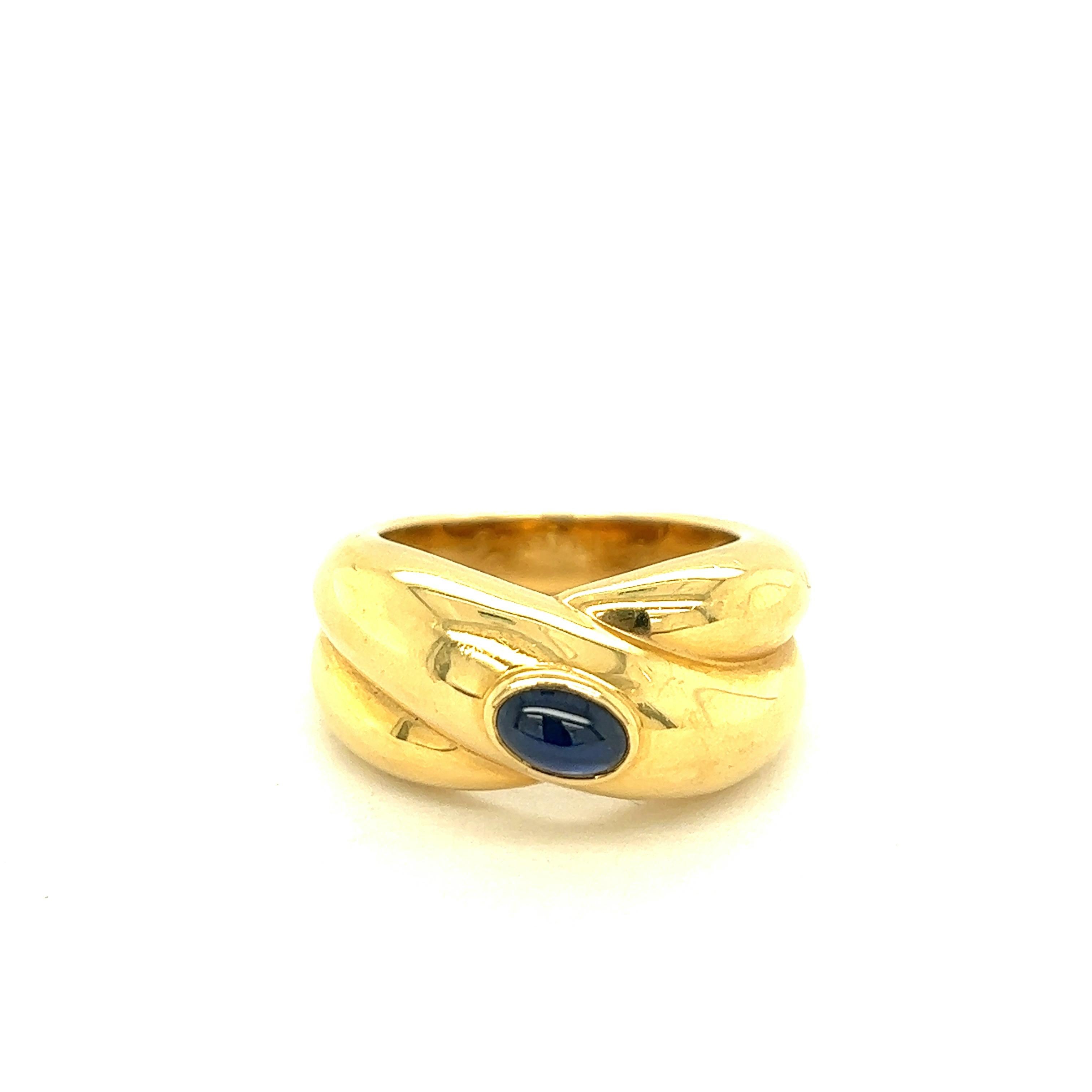 Cartier Cabochon Sapphire 18k Yellow Gold Ring, 1992

Center stone of cabochon bezel-set sapphire (3.4 x 5.4 mm) of approximately 0.30 carat, set on 18 karat yellow gold; marked Cartier, Cartier 1992, 54, 750, B42150

Ring's top width 11 mm

Size: