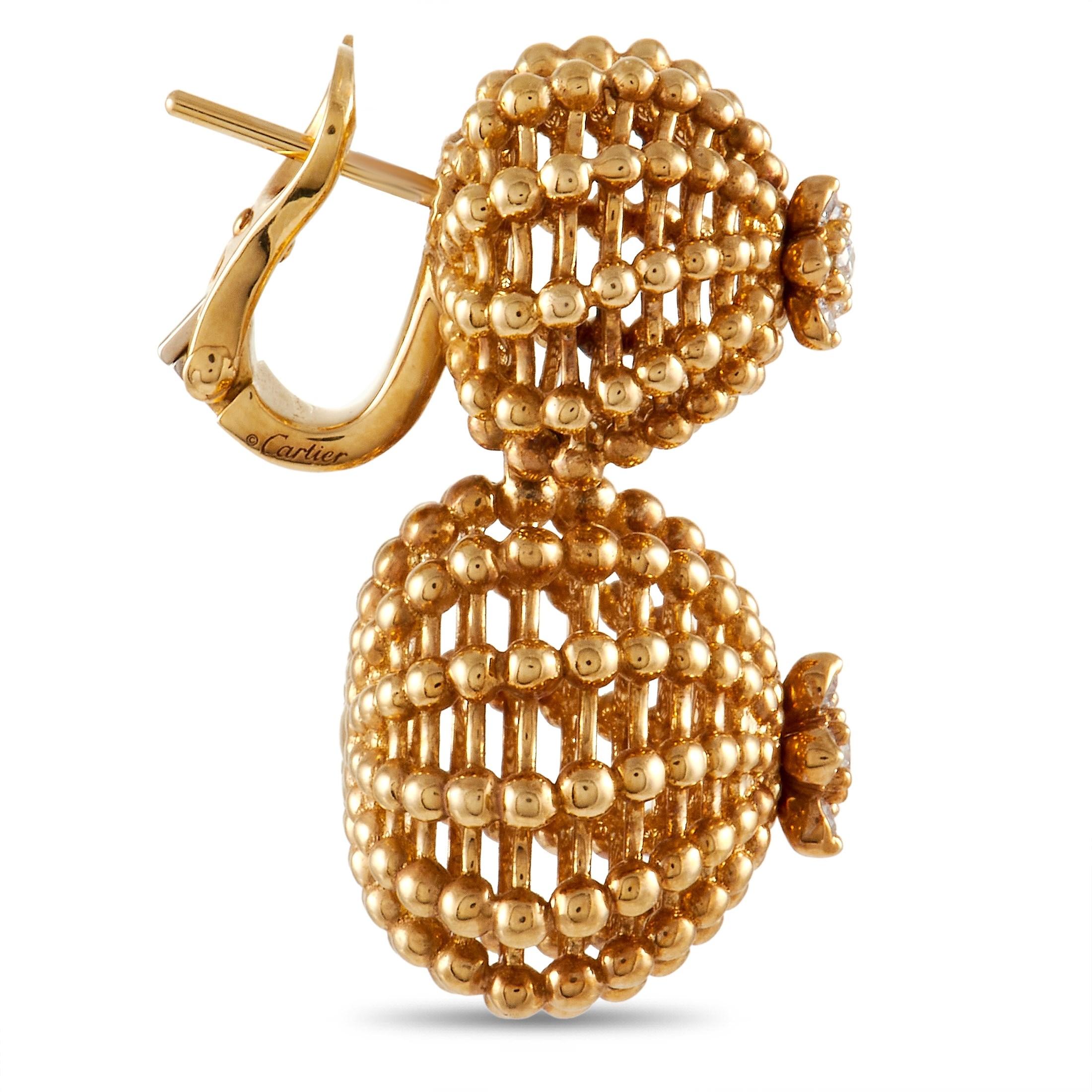 These earrings from the Cartier Cactus de Cartier collection feature incredible attention to detail. Each textured setting is crafted from luxurious 18K Yellow Gold and measures 1” long by .5” wide. Their striking form also highlights the elegant