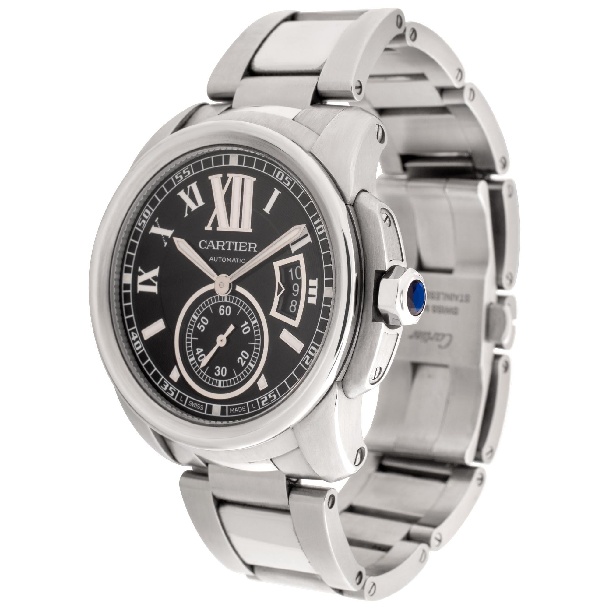 Cartier Calibre in stainless steel. Auto w/ subseconds and date. Black Roman Numeral Dial. 42 mm case size. Ref W7100016. Fine Pre-owned Cartier Watch. Certified preowned Sport Cartier Calibre W7100016 watch is made out of Stainless steel on a