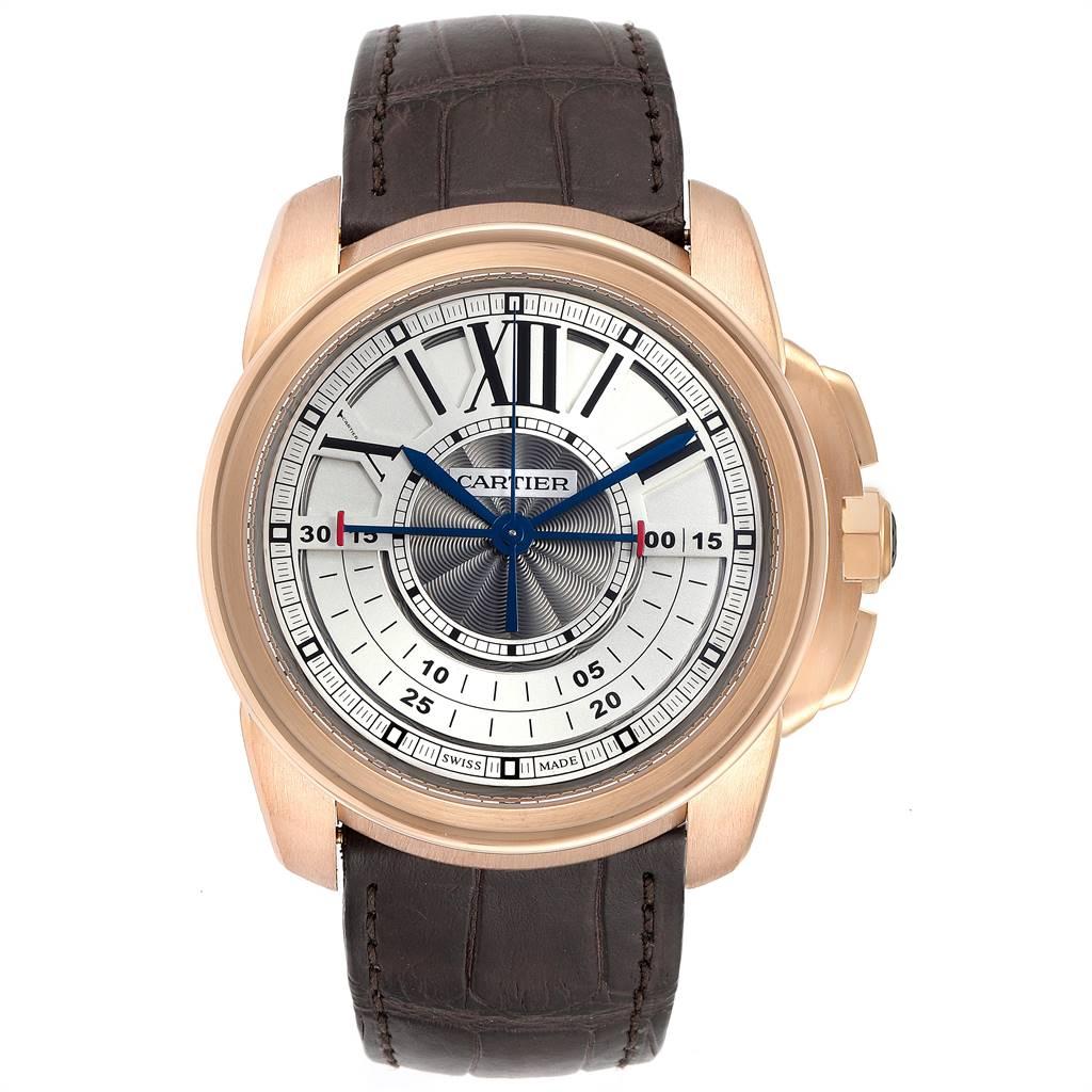 Cartier Calibre Central Chronograph Rose Gold Mens Watch W7100004. Manul winding chronograph movement. 18K rose gold round case 45 mm in diameter. 18K rose gold crown set with faceted blue sapphire. Exhibition sapphire crystal case back.18K rose