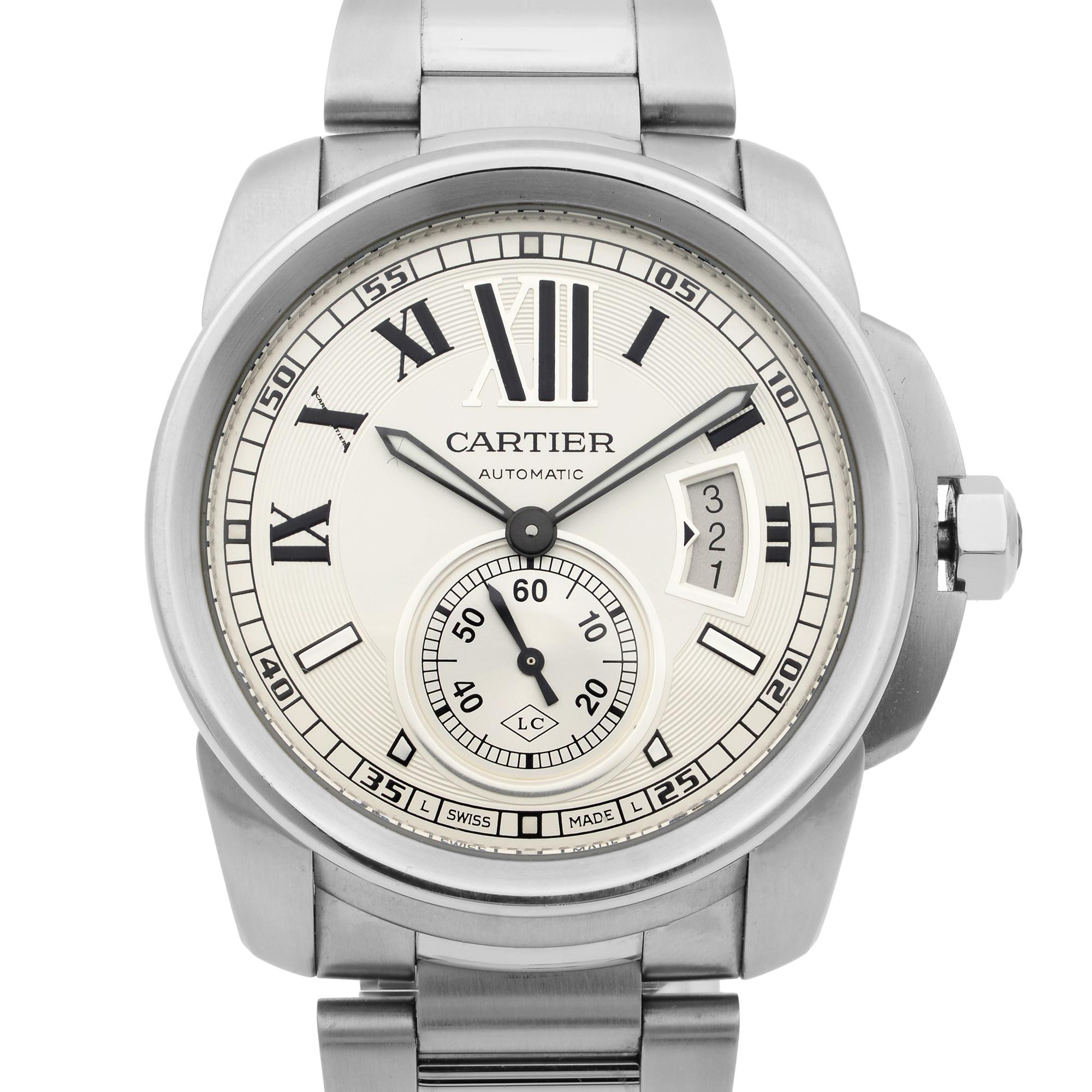 This pre-owned Cartier Calibre de Cartier  W7100015 is a beautiful men's timepiece that is powered by mechanical (automatic) movement which is cased in a stainless steel case. It has a round shape face, date indicator, small seconds subdial dial and