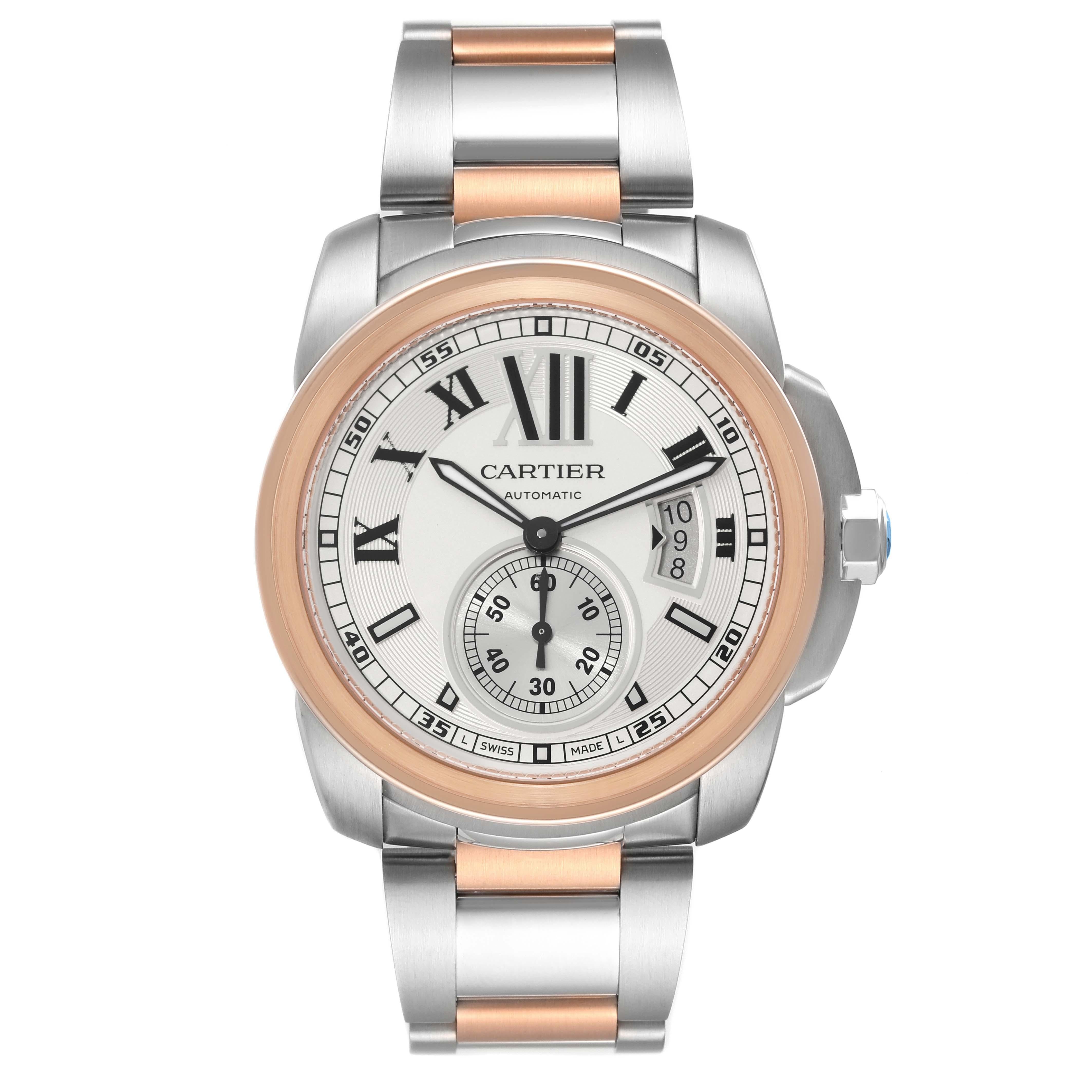 Cartier Calibre Diver Silver Dial Steel Rose Gold Mens Watch W7100036 Papers. Automatic self-winding movement. Stainless steel round case 42.0 mm in diameter. 18K rose gold crown set with faceted blue spinel. 18K rose gold bezel. Scratch resistant
