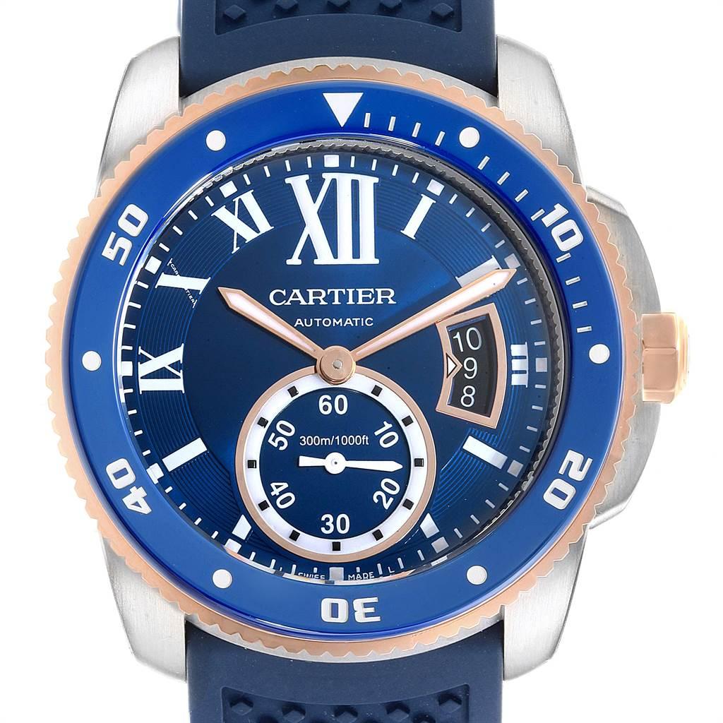 Cartier Calibre Diver Steel Rose Gold Blue Rubber Strap Watch W2CA0009. Automatic self-winding movement. Stainless steel round case 42.0 mm in diameter. 18K rose gold crown set with faceted blue spinel. Case thickness: 11 mm. Blue ADLC coated