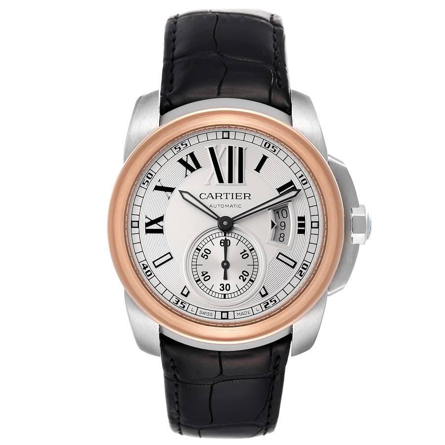 Cartier Calibre Diver Stahl Rose Gold Silber Zifferblatt Uhr W7100036. Automatisches Uhrwerk mit Selbstaufzug. Rundes Edelstahlgehäuse mit einem Durchmesser von 42,0 mm. Krone aus 18 Karat Roségold, besetzt mit facettiertem blauem Spinell. Lünette
