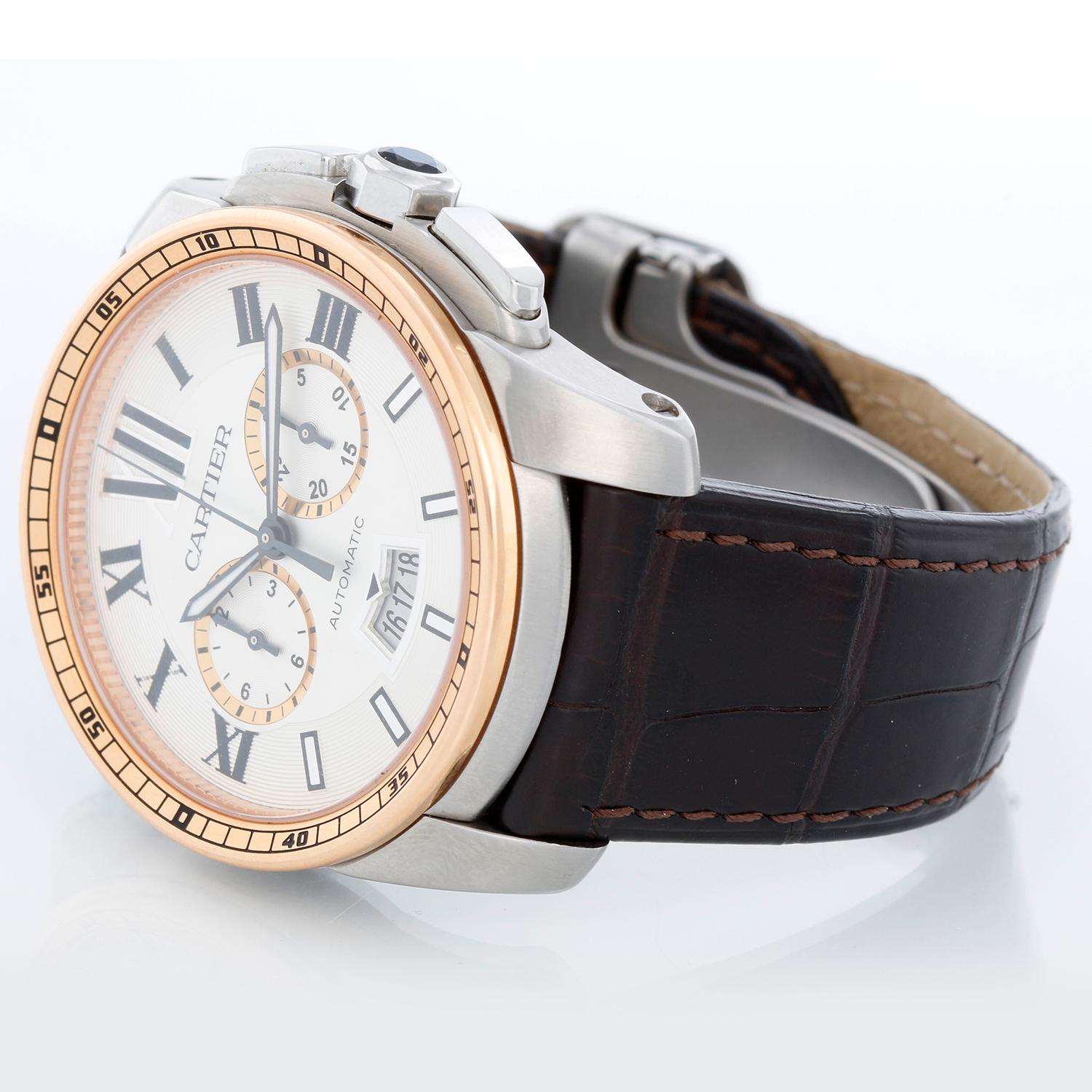 Cartier Calibre Stainless Steel & Rose Gold Men's 42mm Watch W7100043 3578 - Automatic winding; Chronograph . Stainless steel case with rose gold bezel; exposition back  (42mm diameter). Silver dial with Roman numerals; subdials; date at 6 o'clock.
