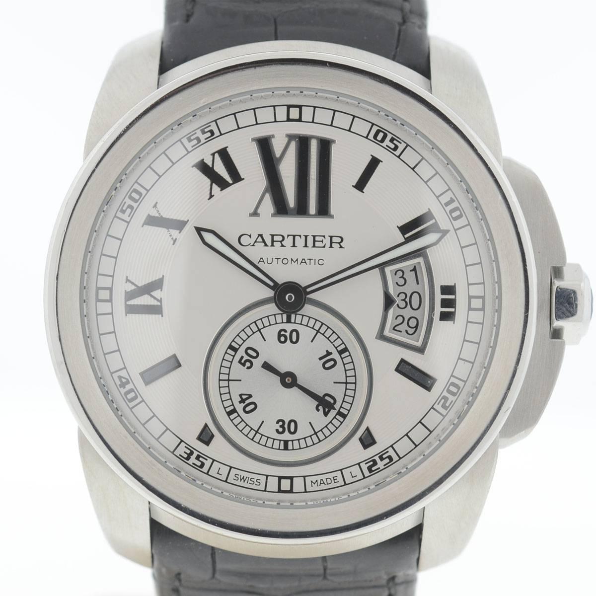 Company-Cartier
Style-Sport
Model-Calibre
Reference Number-W7100037
Case Metal-Stainless Steel
Case Measurement-42mm 
Bracelet-Fits 7'' will adjust up to 8''
Dial-Silvered
Bezel-Stainless Steel - Excellent condition 
Crystal-Scratch Sapphire
