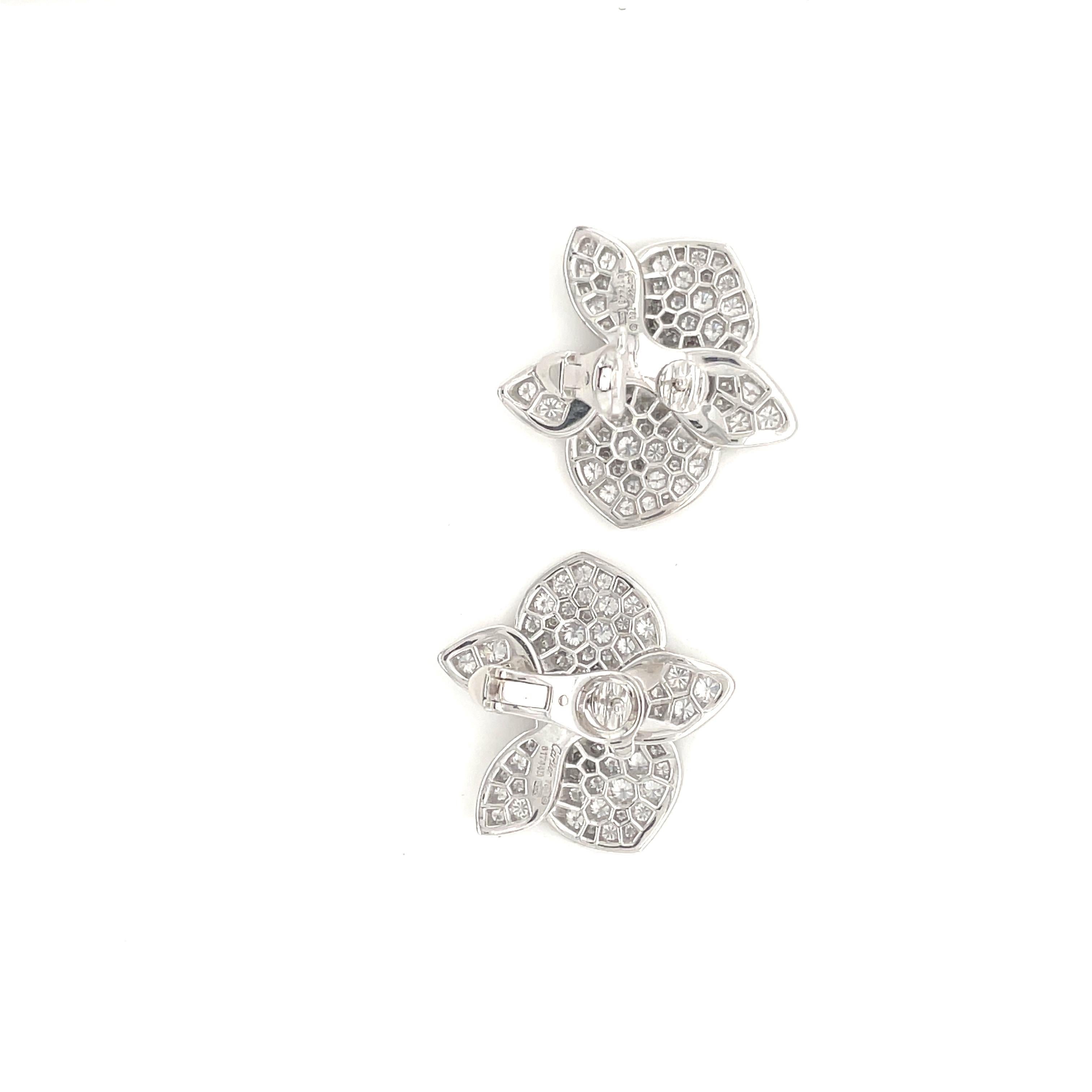 Stunning Cartier Caresse d' Orchidees White Gold and Diamond LARGE size earrings with certification papers. 2.89ctw F VVS, comes with box and certification papers. These earrings are for pierced ears. Stamped Cartier 750