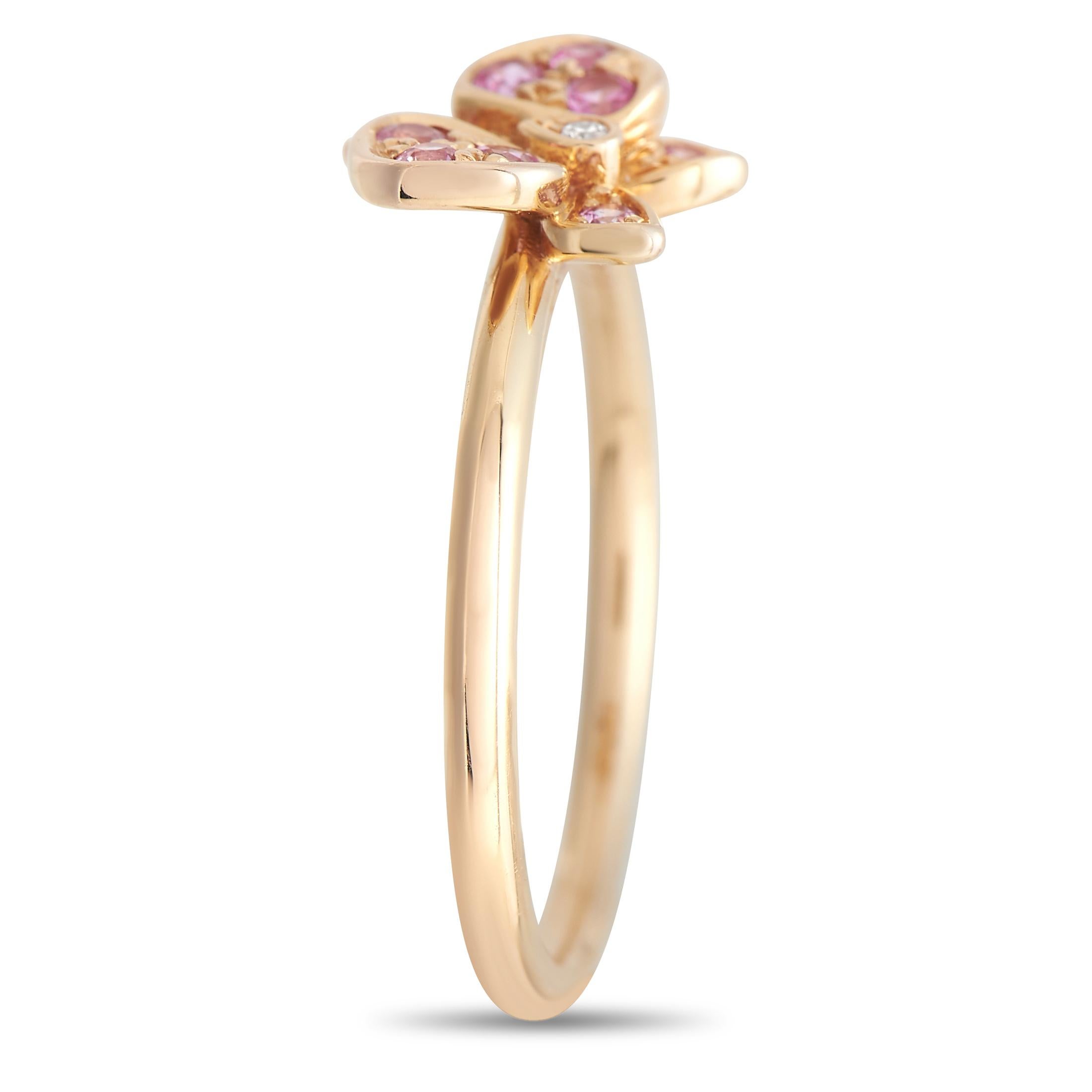 This Cartier Caresse D'Orchidees is a delicate piece that is incredibly elegant in design. At the top of the 18K Yellow Gold setting, a stunning array of pink diamonds sparkle and shine from their place within a dainty orchid-shaped design. This