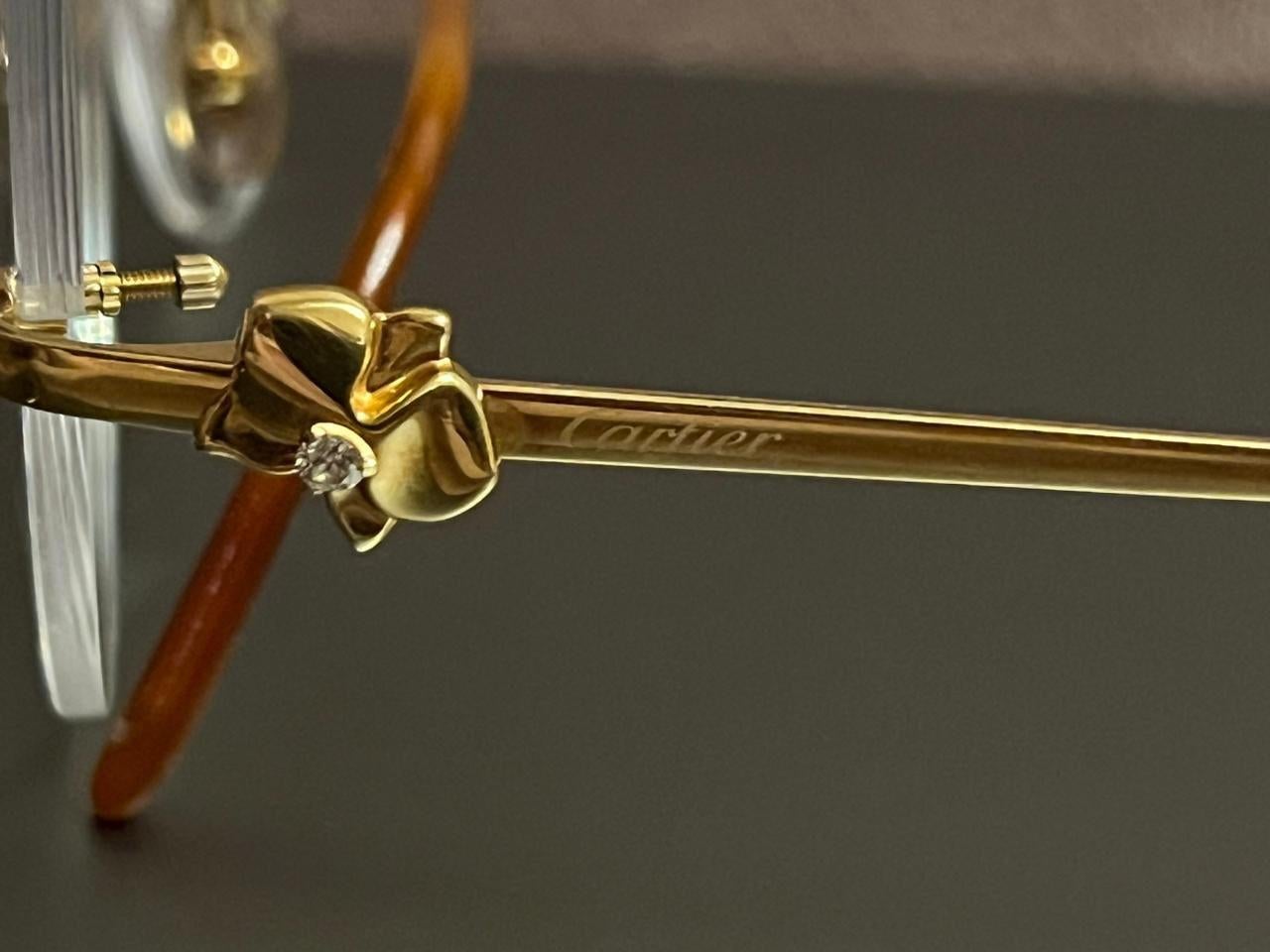 CARTIER Caresse d'Orchidées de Cartier Solid Gold 18K Eyeglasses

Cartier Caresse d'orchidées Eyeglasses
18K Yellow Gold
Comes with Cartier case and papers
Made in France
