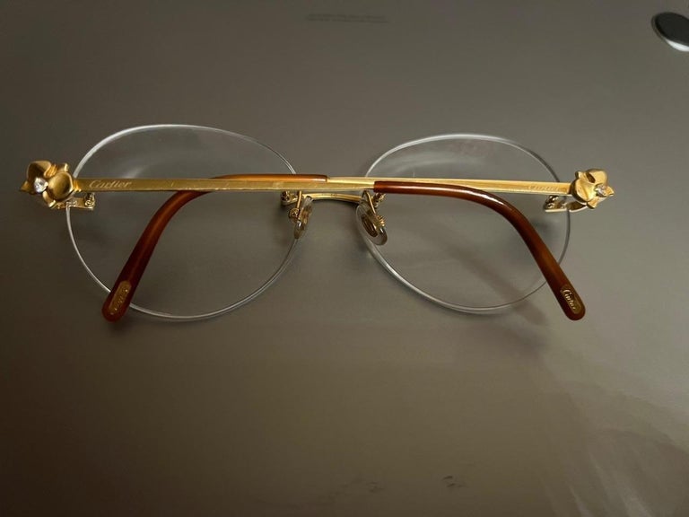 CARTIER Lunettes Caresse d Orchidees de Cartier Or massif 18K