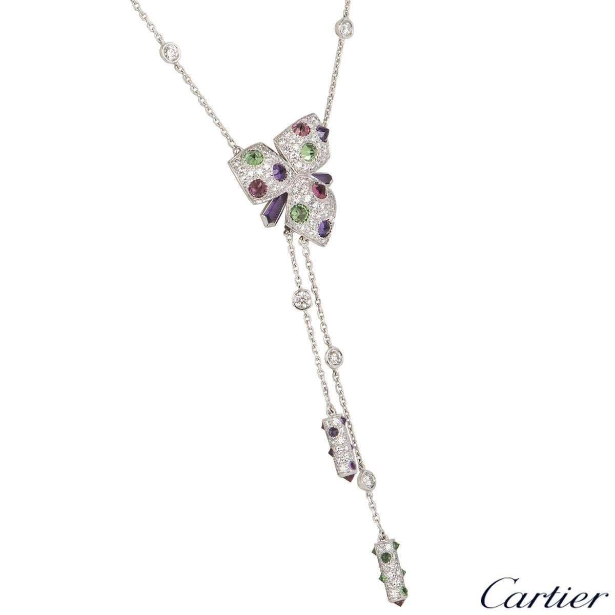 A beautiful 18k white gold necklace from the Caresse d'Orchidées collection by Cartier. The main body of the necklace features reverse set amethysts, pink tourmalines, tsavorites and pave round brilliant cut diamonds totalling approximately 0.80ct.